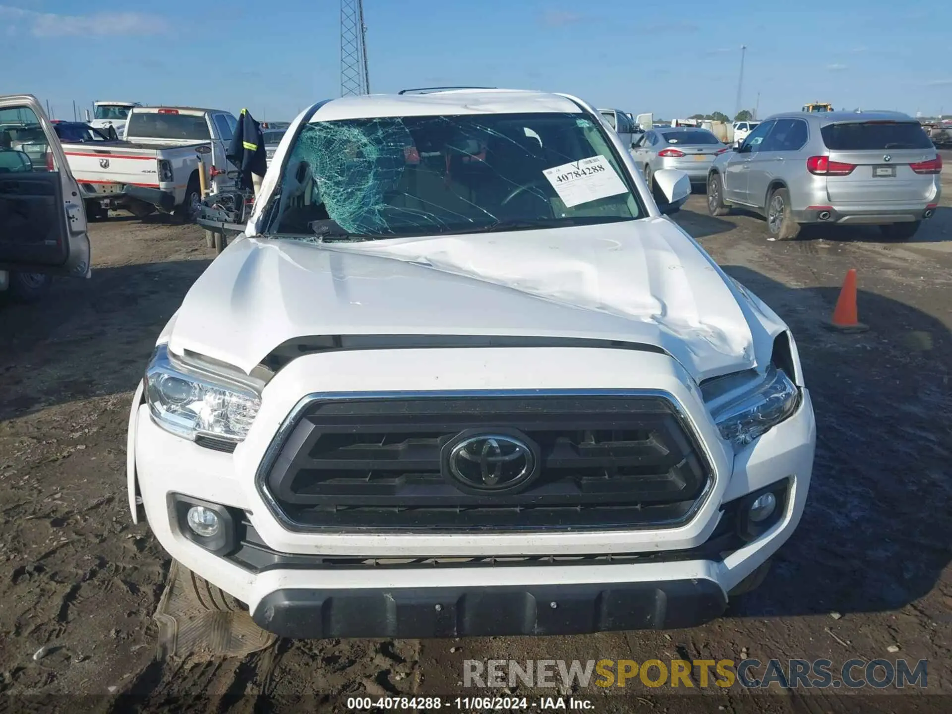 12 Photograph of a damaged car 5TFAZ5CN8MX098979 TOYOTA TACOMA 2021