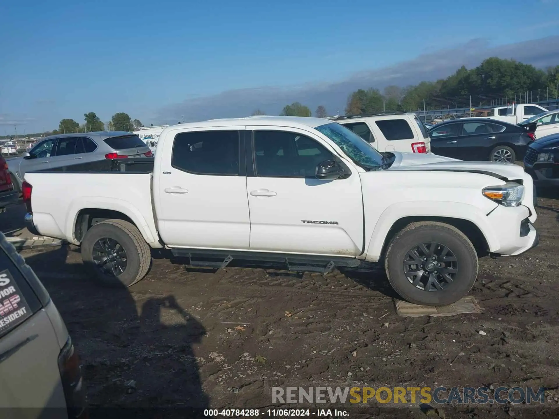 13 Photograph of a damaged car 5TFAZ5CN8MX098979 TOYOTA TACOMA 2021