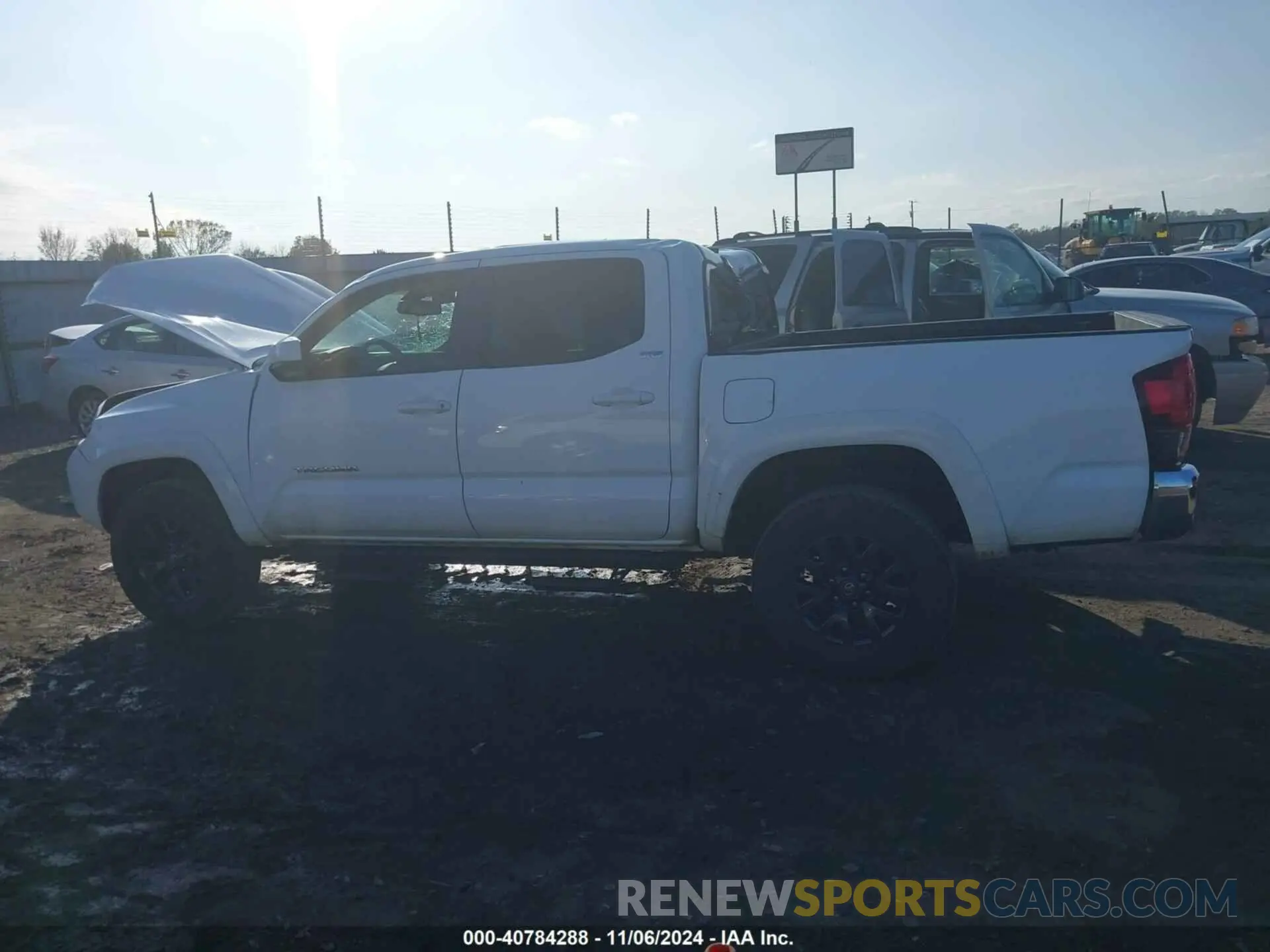 14 Photograph of a damaged car 5TFAZ5CN8MX098979 TOYOTA TACOMA 2021