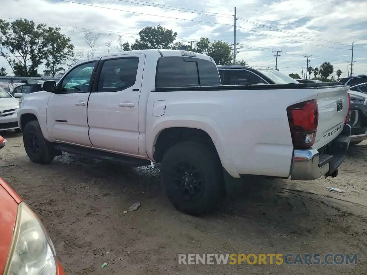 2 Photograph of a damaged car 5TFAZ5CN9MX109780 TOYOTA TACOMA 2021
