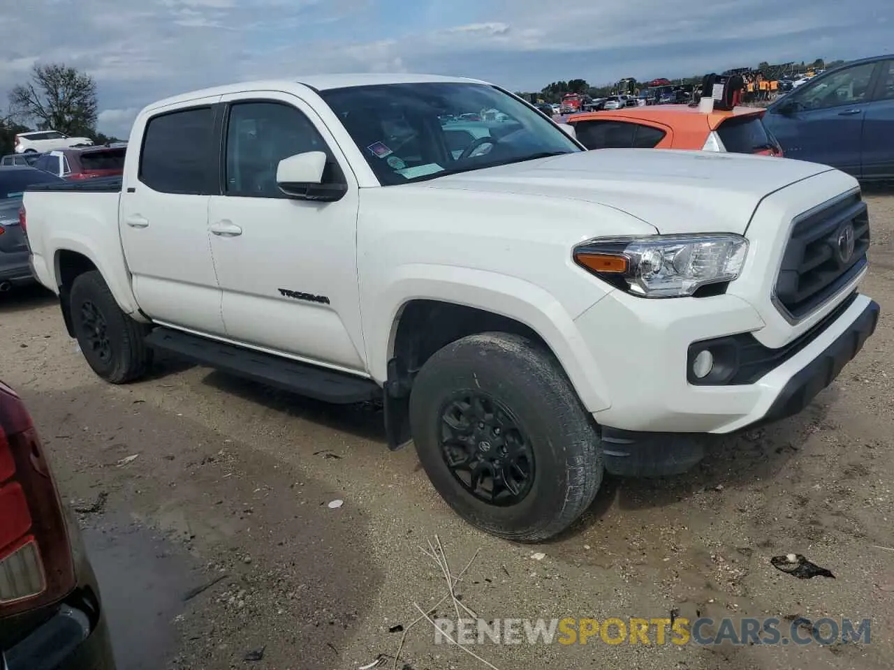 4 Photograph of a damaged car 5TFAZ5CN9MX109780 TOYOTA TACOMA 2021