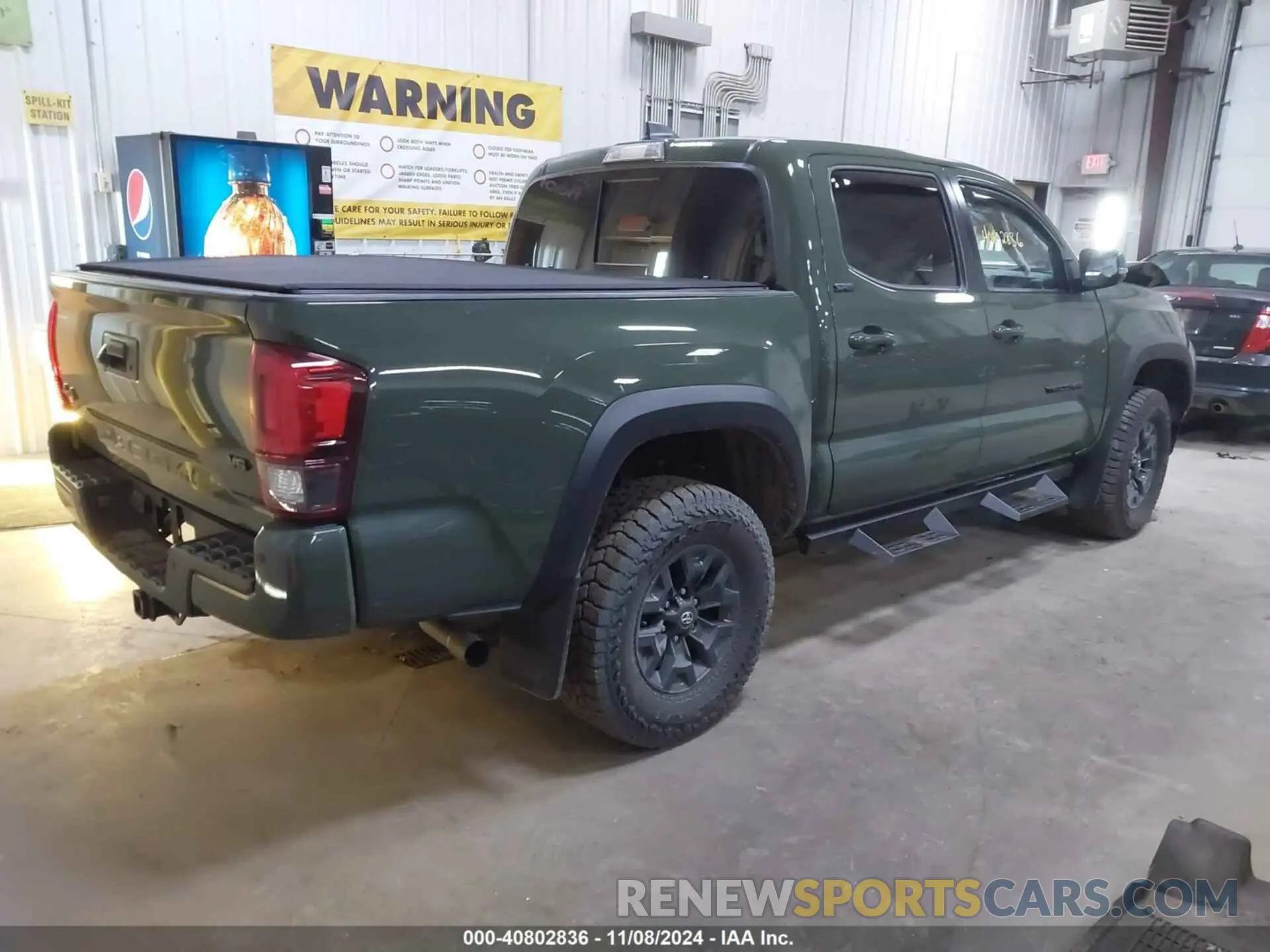 4 Photograph of a damaged car 5TFCZ5AN0MX263497 TOYOTA TACOMA 2021