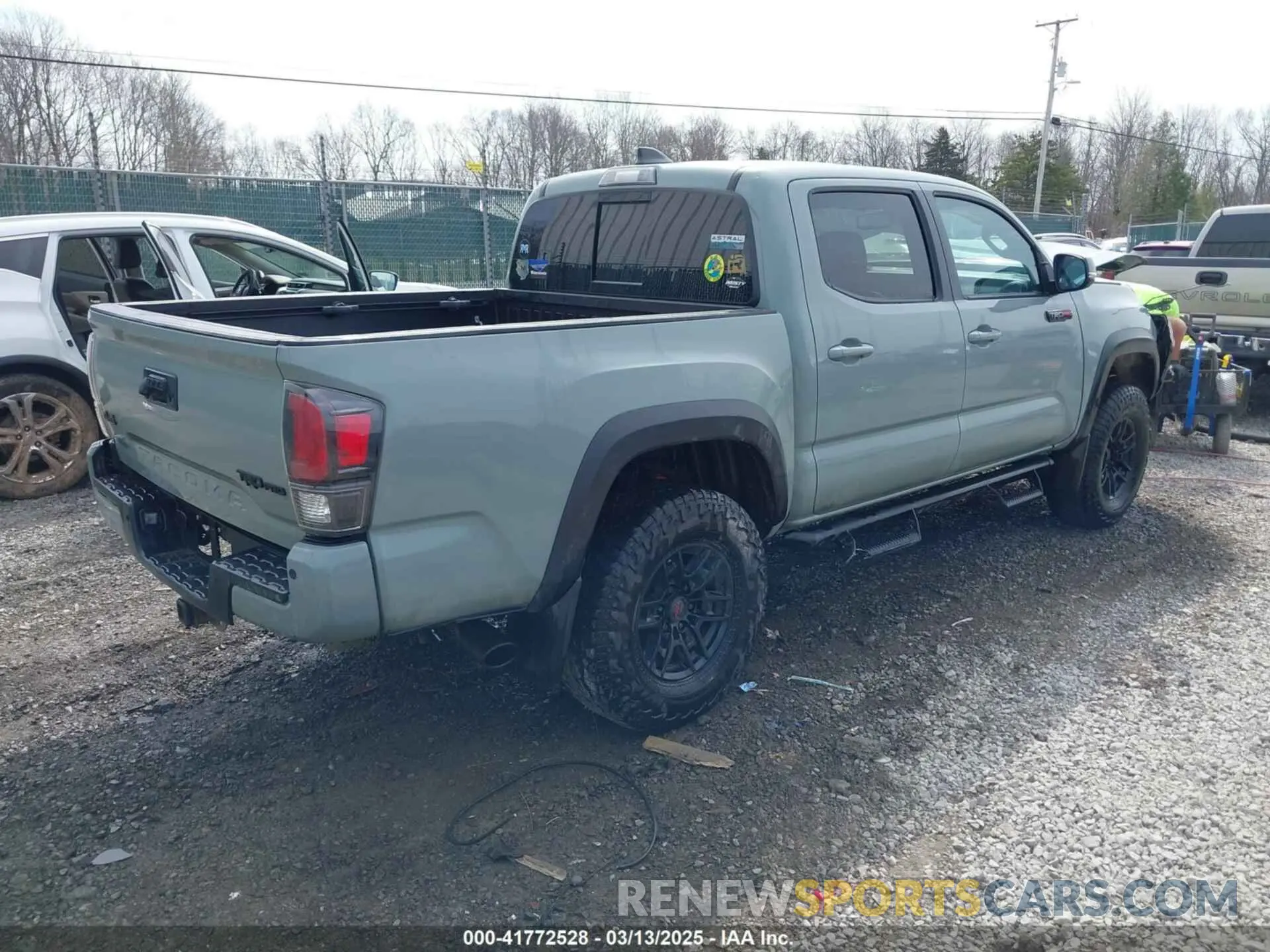 4 Photograph of a damaged car 5TFCZ5AN1MX248460 TOYOTA TACOMA 2021