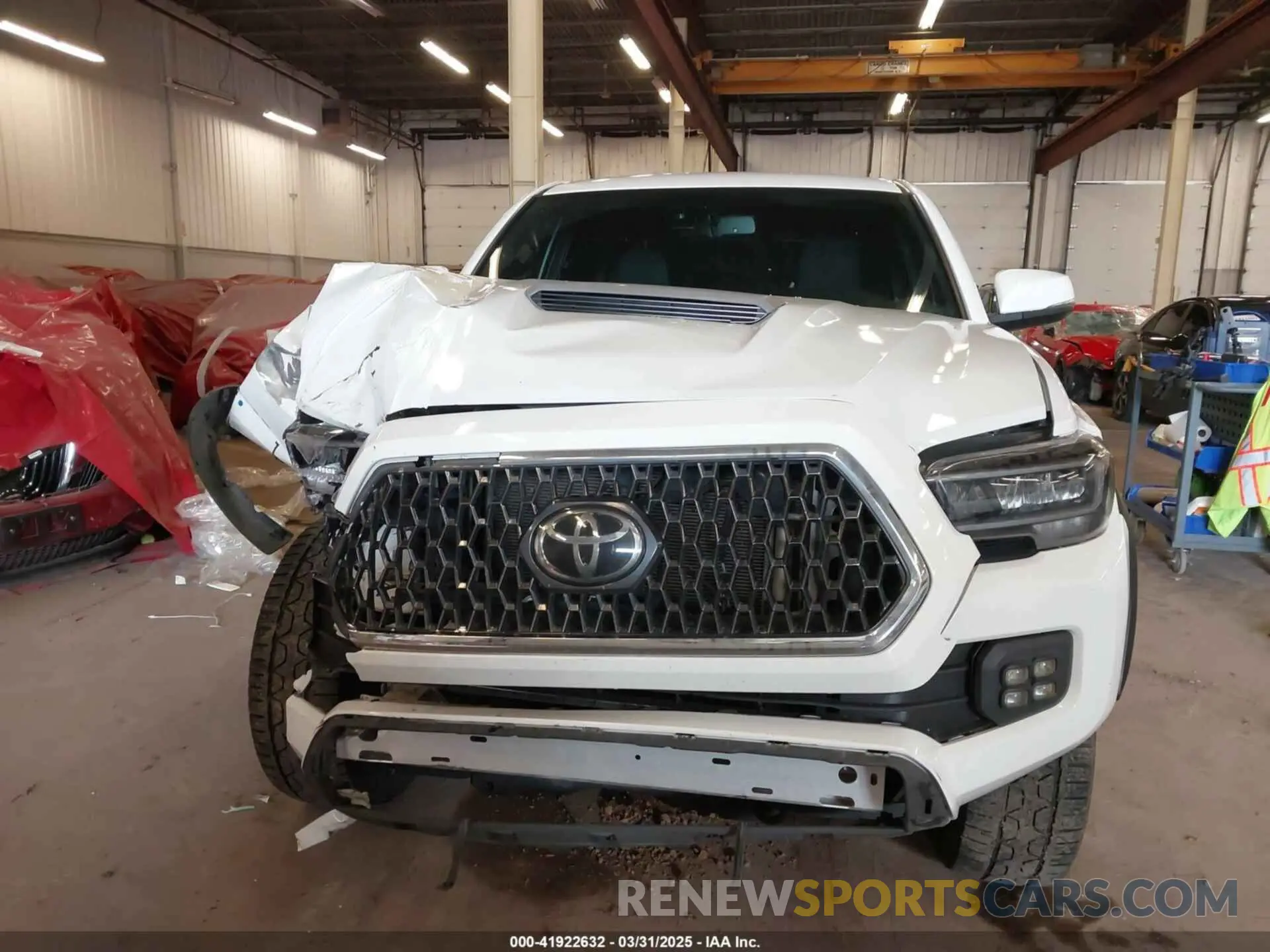 12 Photograph of a damaged car 5TFCZ5AN1MX268370 TOYOTA TACOMA 2021