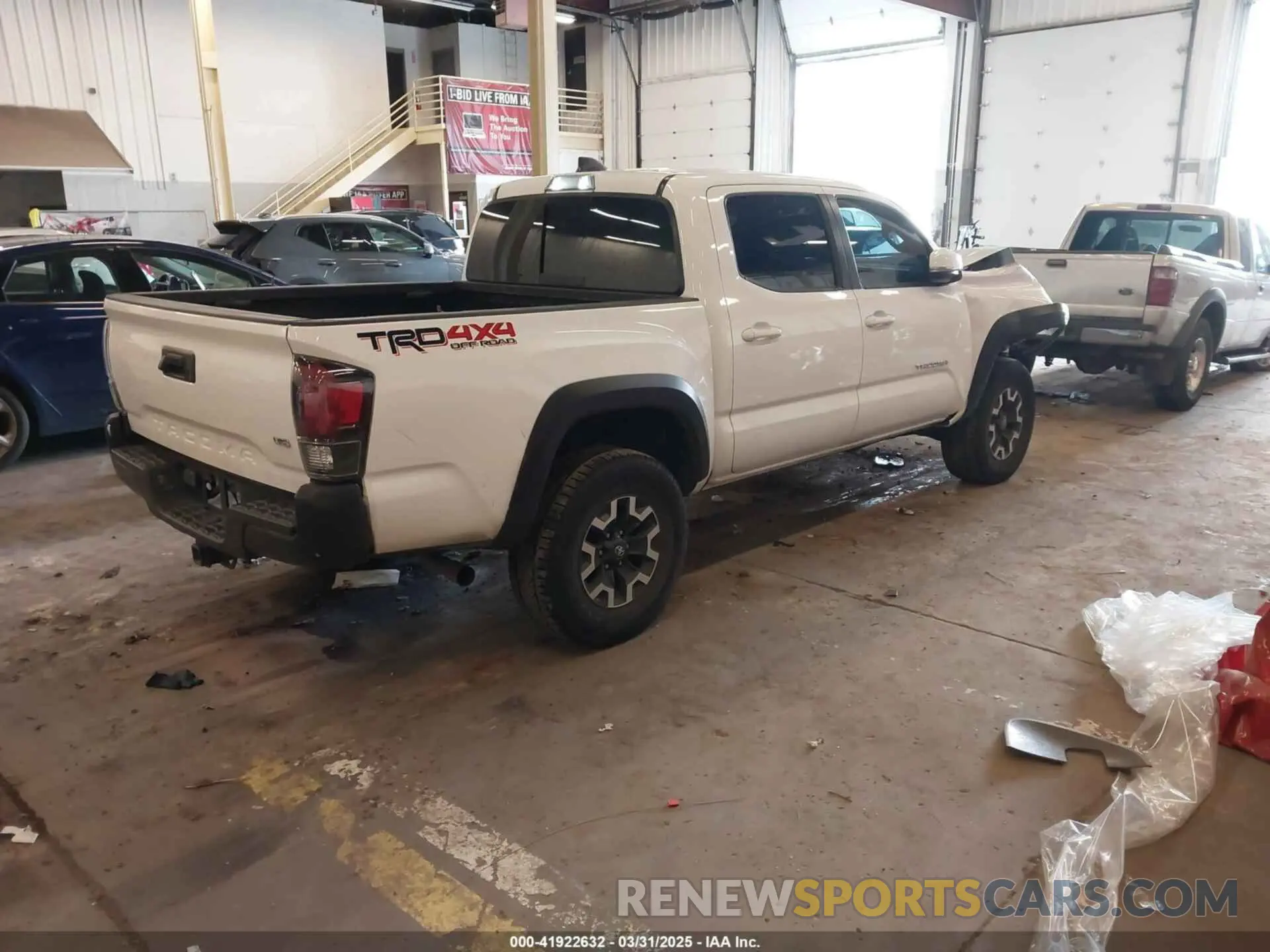 4 Photograph of a damaged car 5TFCZ5AN1MX268370 TOYOTA TACOMA 2021