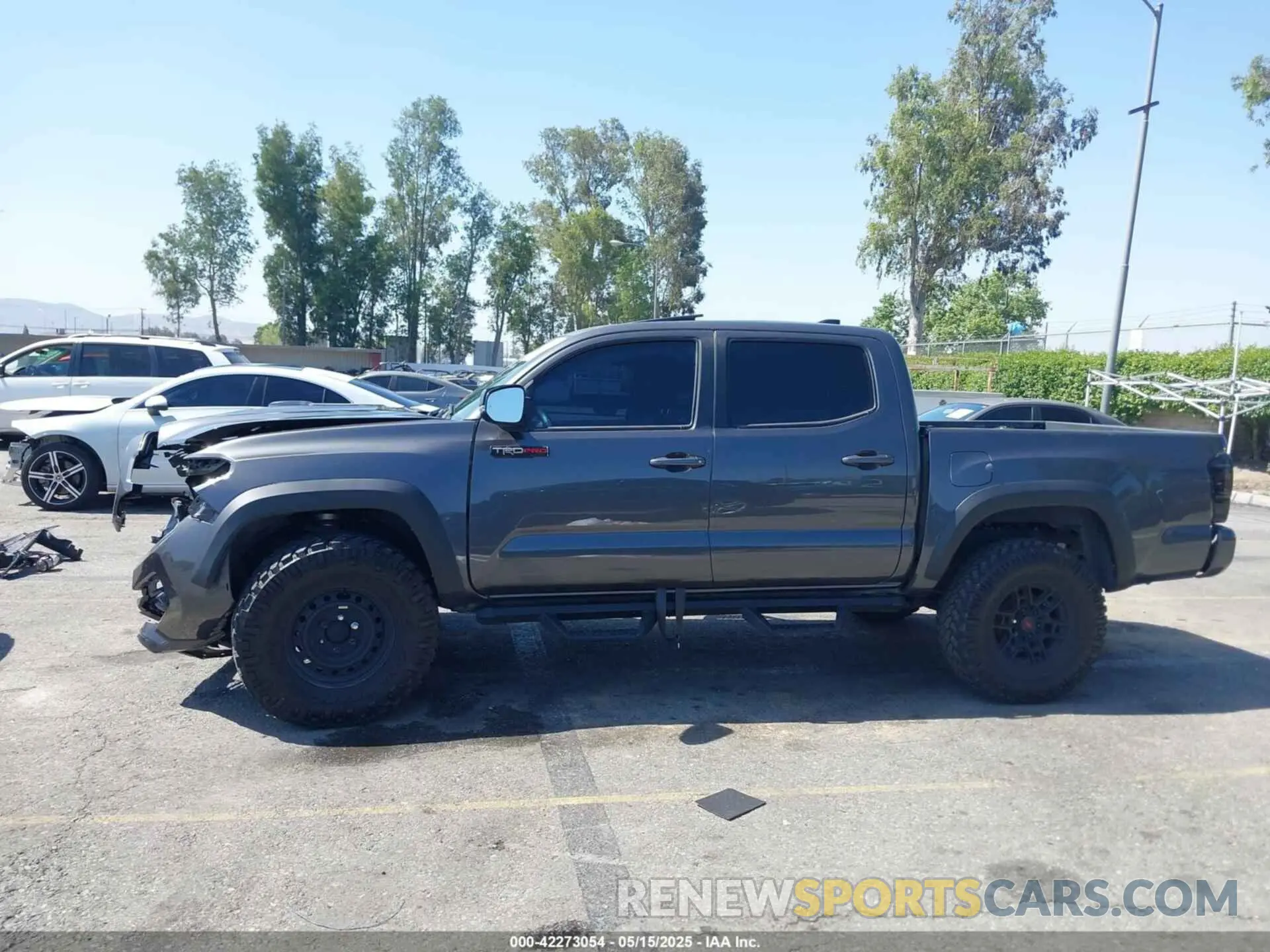 14 Photograph of a damaged car 5TFCZ5AN1MX274315 TOYOTA TACOMA 2021