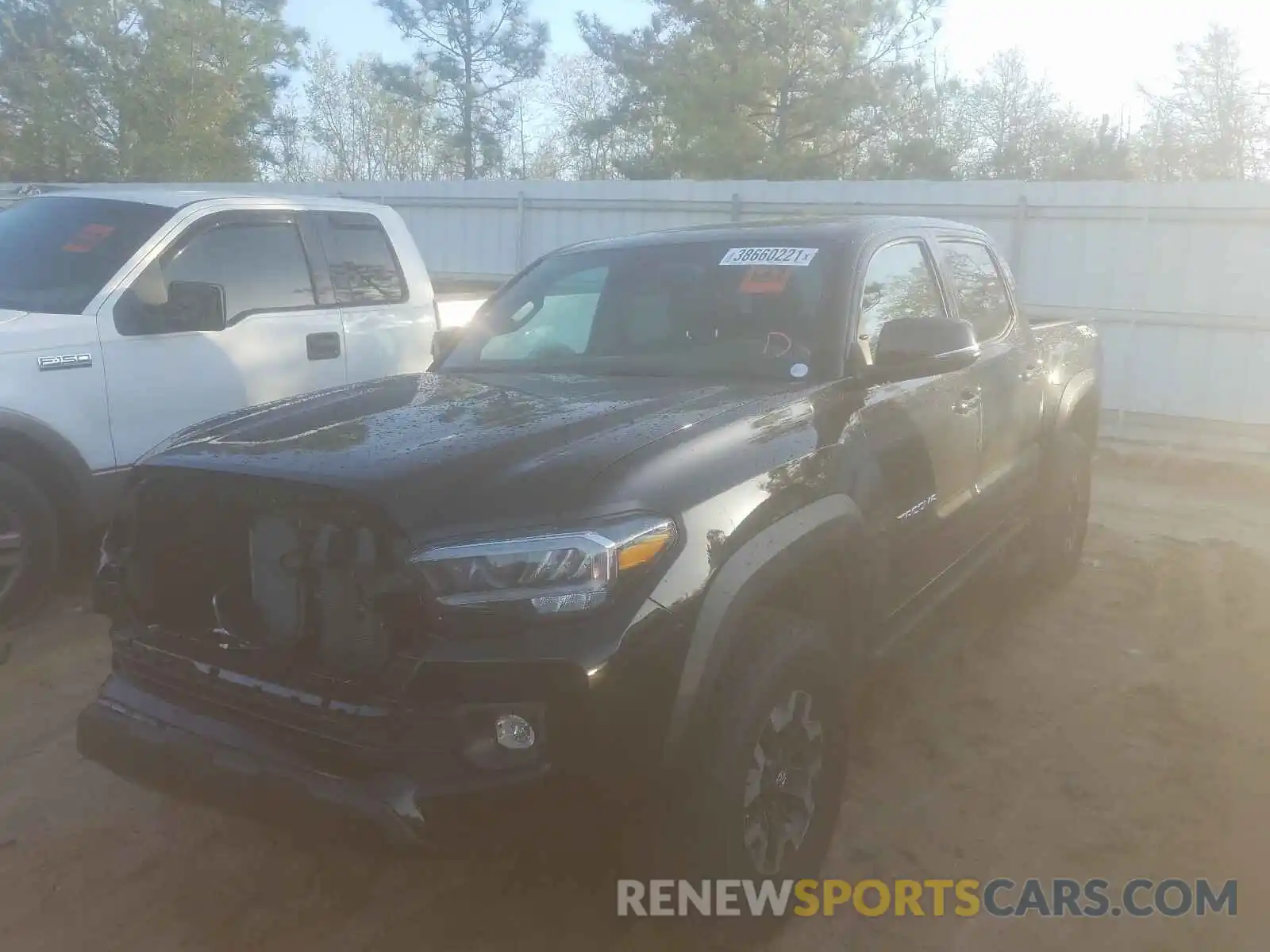 2 Photograph of a damaged car 5TFCZ5AN3MX245415 TOYOTA TACOMA 2021