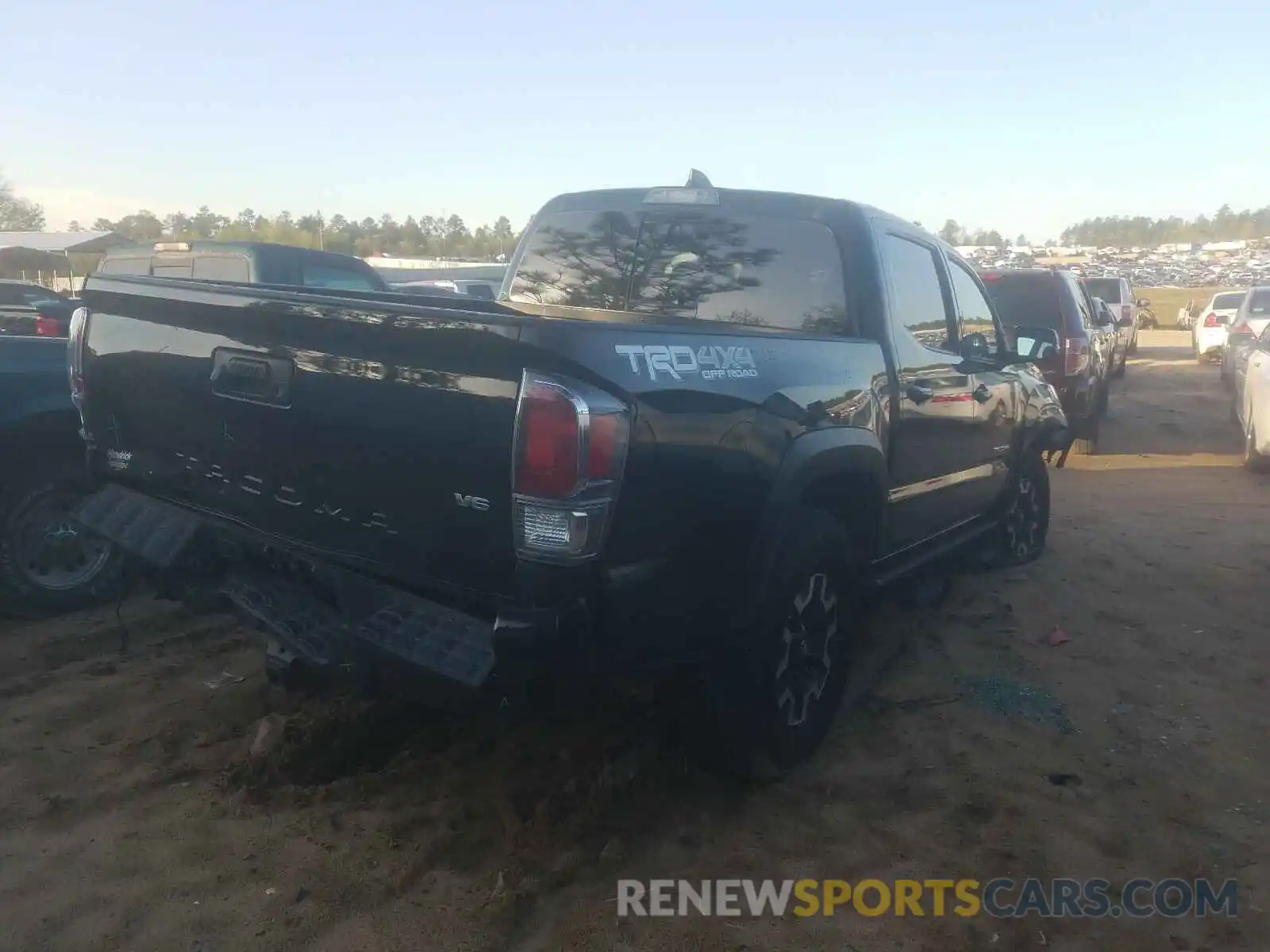 4 Photograph of a damaged car 5TFCZ5AN3MX245415 TOYOTA TACOMA 2021