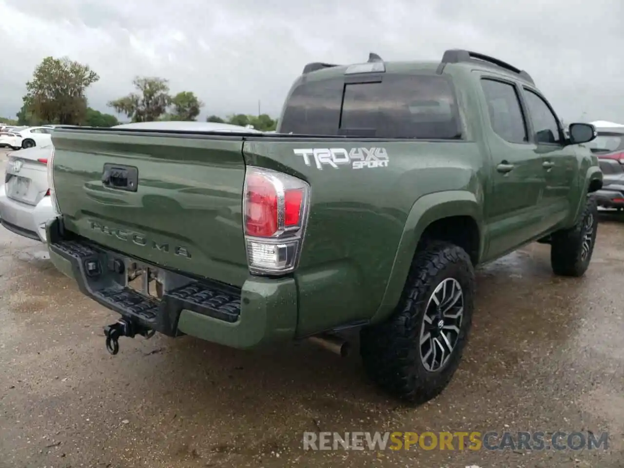 4 Photograph of a damaged car 5TFCZ5AN3MX256043 TOYOTA TACOMA 2021