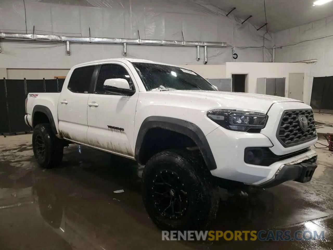 4 Photograph of a damaged car 5TFCZ5AN4MX258934 TOYOTA TACOMA 2021