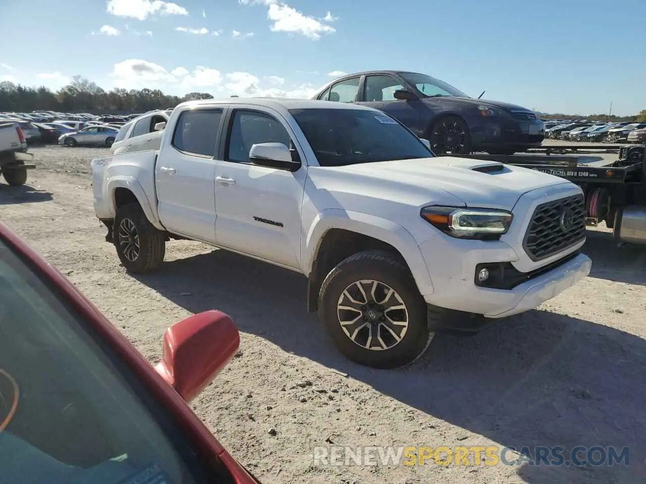 4 Photograph of a damaged car 5TFCZ5AN5MX261552 TOYOTA TACOMA 2021