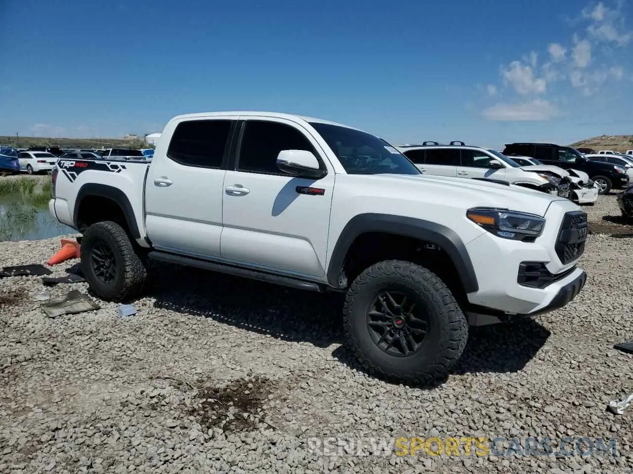 4 Photograph of a damaged car 5TFCZ5AN5MX277136 TOYOTA TACOMA 2021
