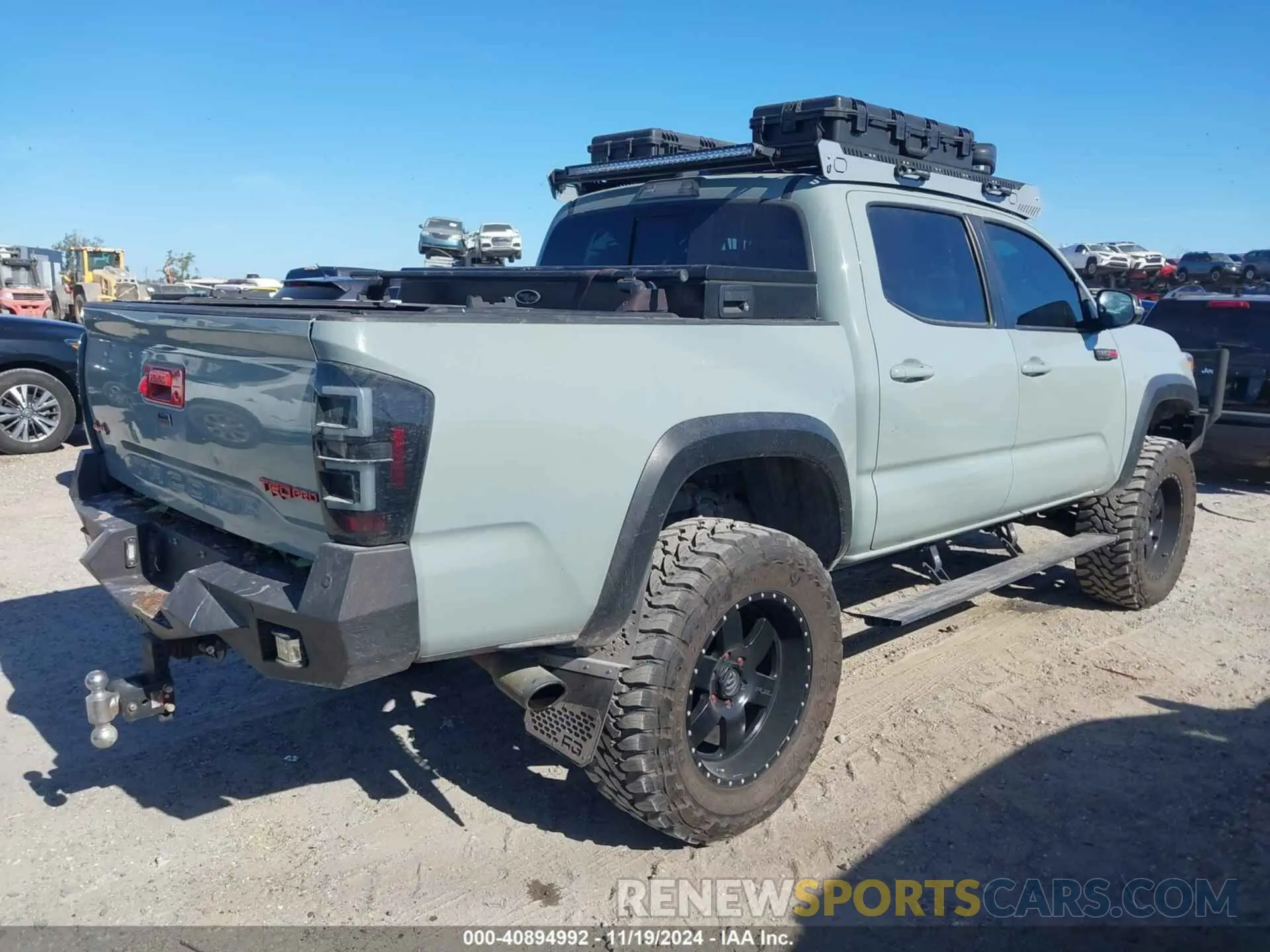 4 Photograph of a damaged car 5TFCZ5AN8MX248875 TOYOTA TACOMA 2021