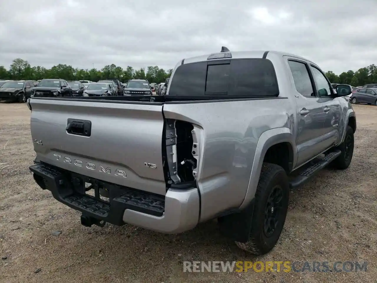 4 Photograph of a damaged car 5TFCZ5AN8MX256023 TOYOTA TACOMA 2021