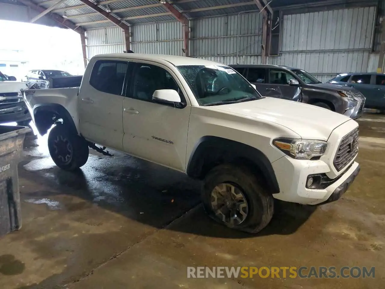 4 Photograph of a damaged car 5TFCZ5AN8MX260072 TOYOTA TACOMA 2021