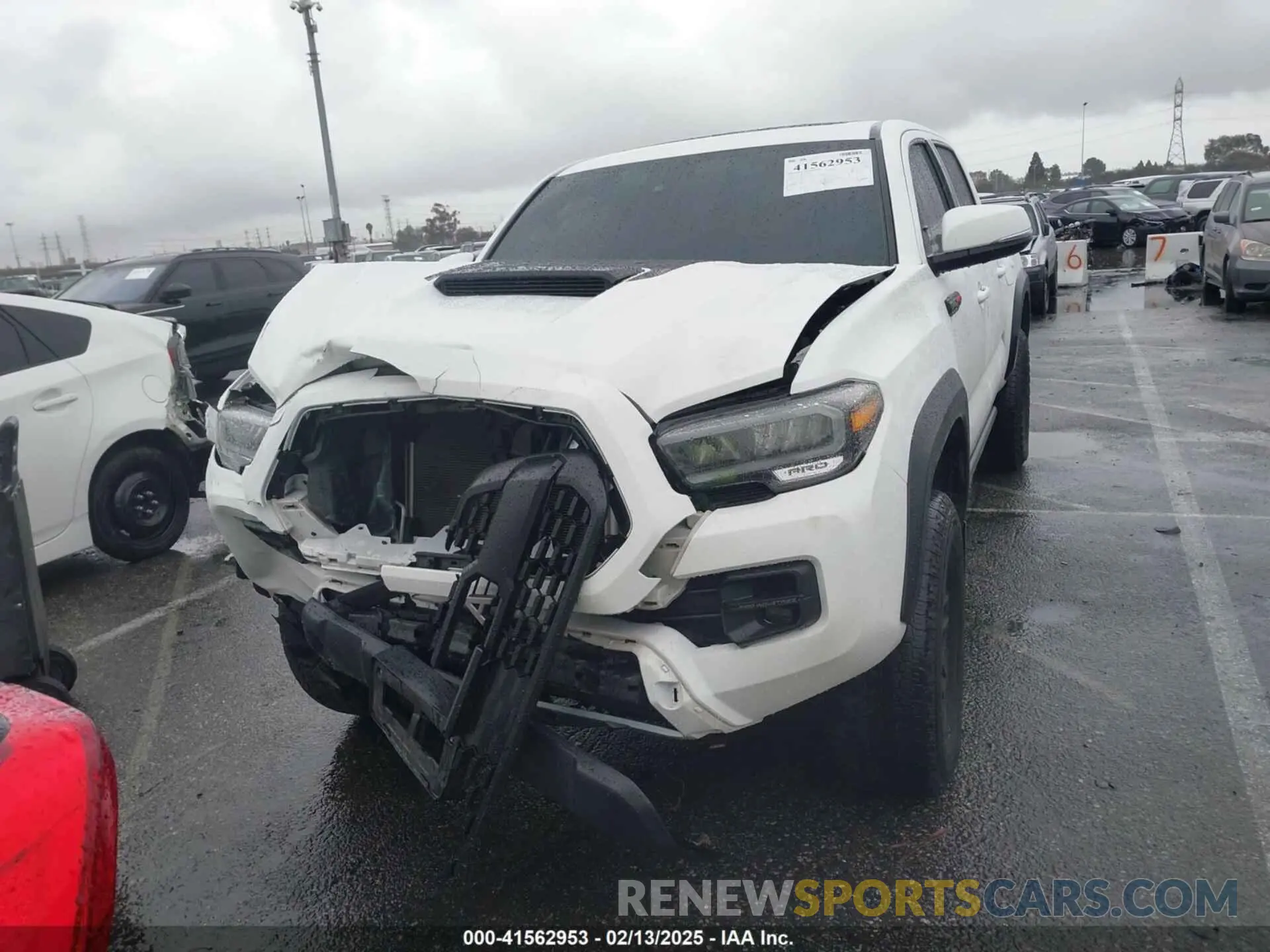 12 Photograph of a damaged car 5TFCZ5AN8MX260458 TOYOTA TACOMA 2021