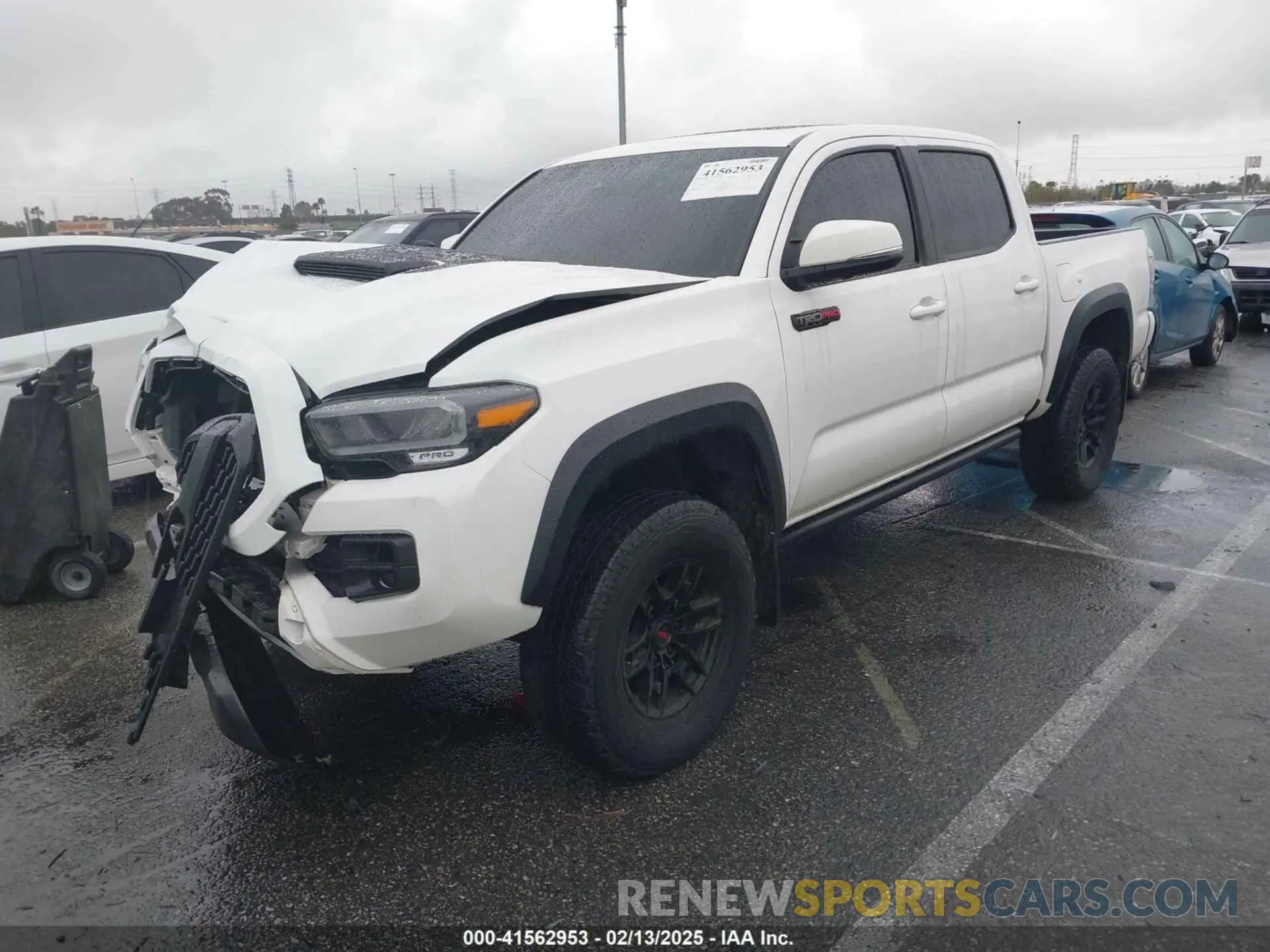 2 Photograph of a damaged car 5TFCZ5AN8MX260458 TOYOTA TACOMA 2021