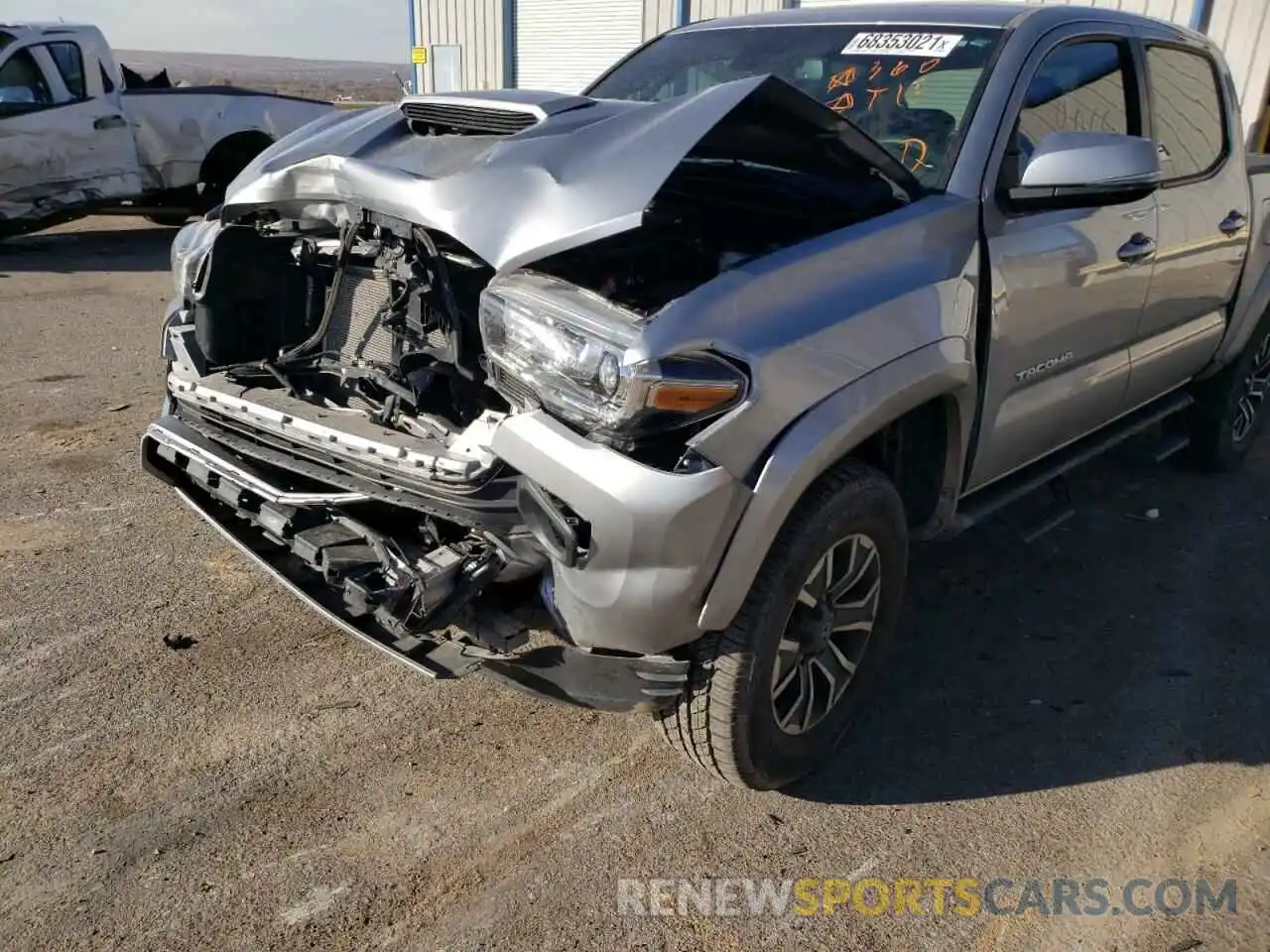 2 Photograph of a damaged car 5TFCZ5AN9MX244513 TOYOTA TACOMA 2021