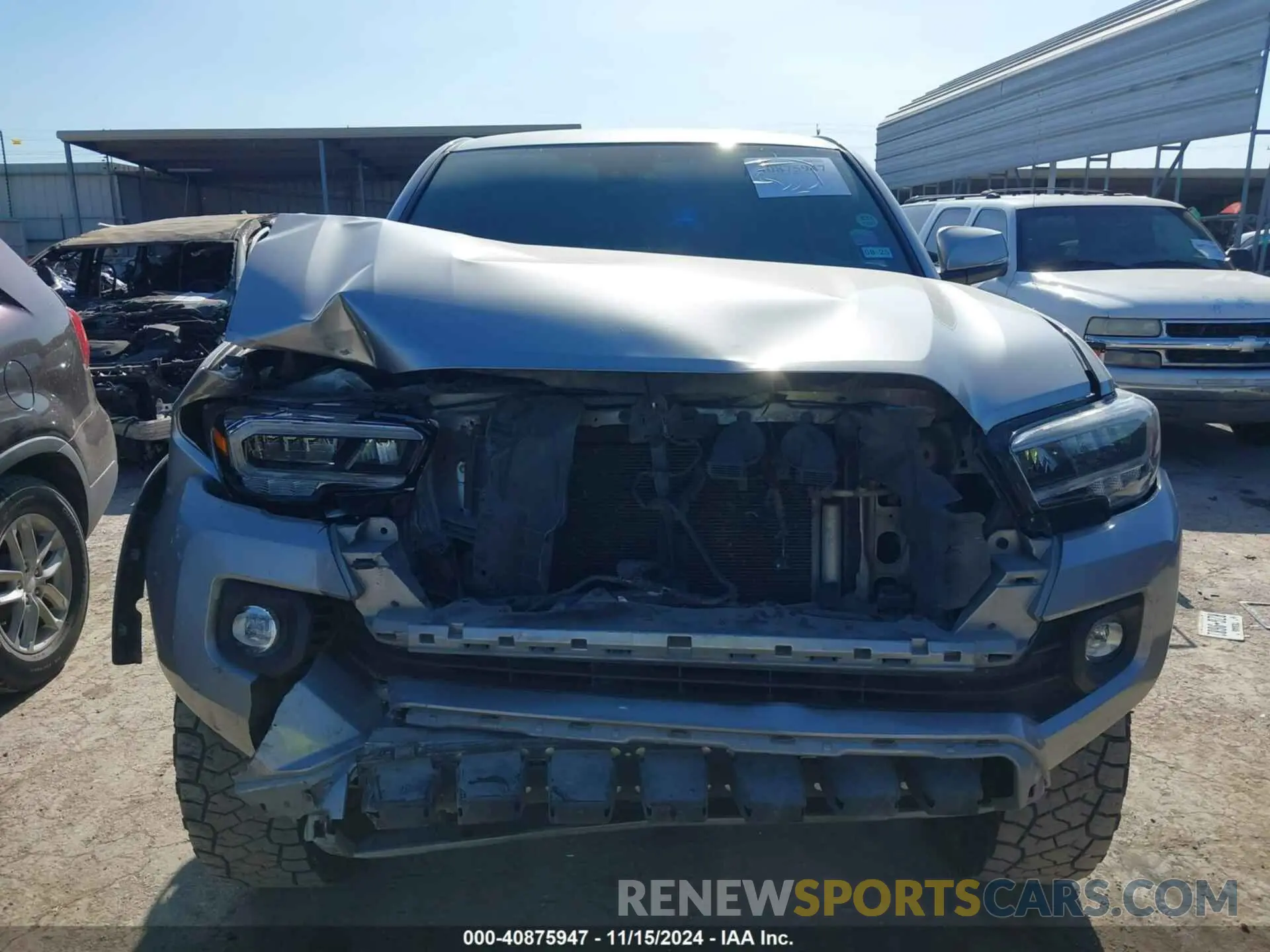 12 Photograph of a damaged car 5TFCZ5AN9MX258511 TOYOTA TACOMA 2021