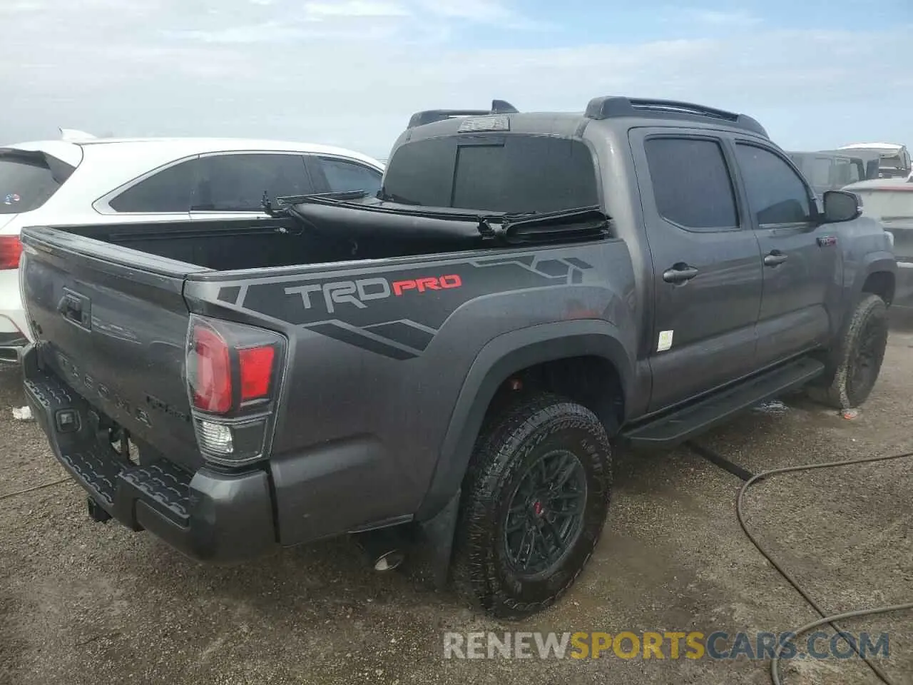 3 Photograph of a damaged car 5TFCZ5AN9MX269296 TOYOTA TACOMA 2021