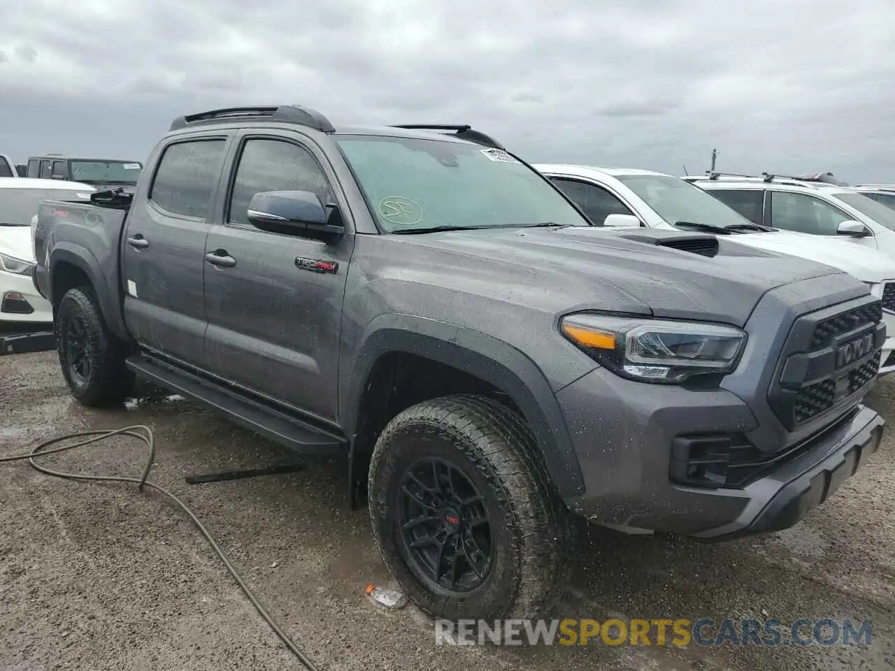 4 Photograph of a damaged car 5TFCZ5AN9MX269296 TOYOTA TACOMA 2021