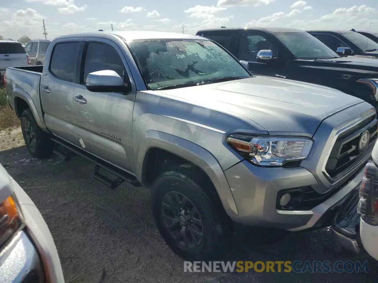 4 Photograph of a damaged car 3TMAZ5CN1NM165218 TOYOTA TACOMA 2022