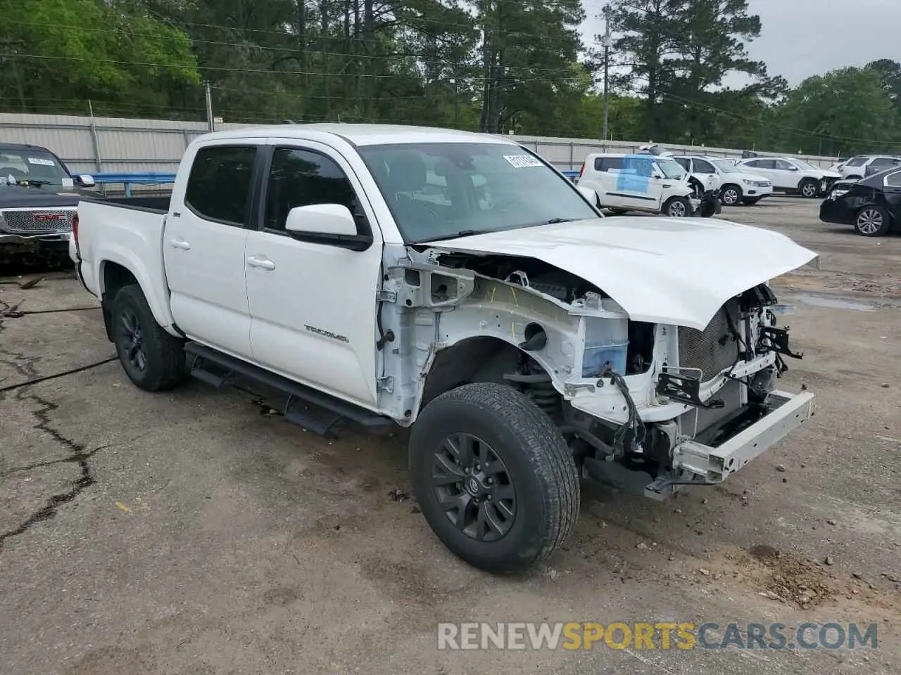 4 Photograph of a damaged car 3TMAZ5CN3NM195188 TOYOTA TACOMA 2022
