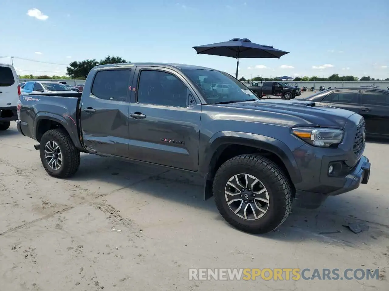 4 Photograph of a damaged car 3TMAZ5CN4NM184443 TOYOTA TACOMA 2022