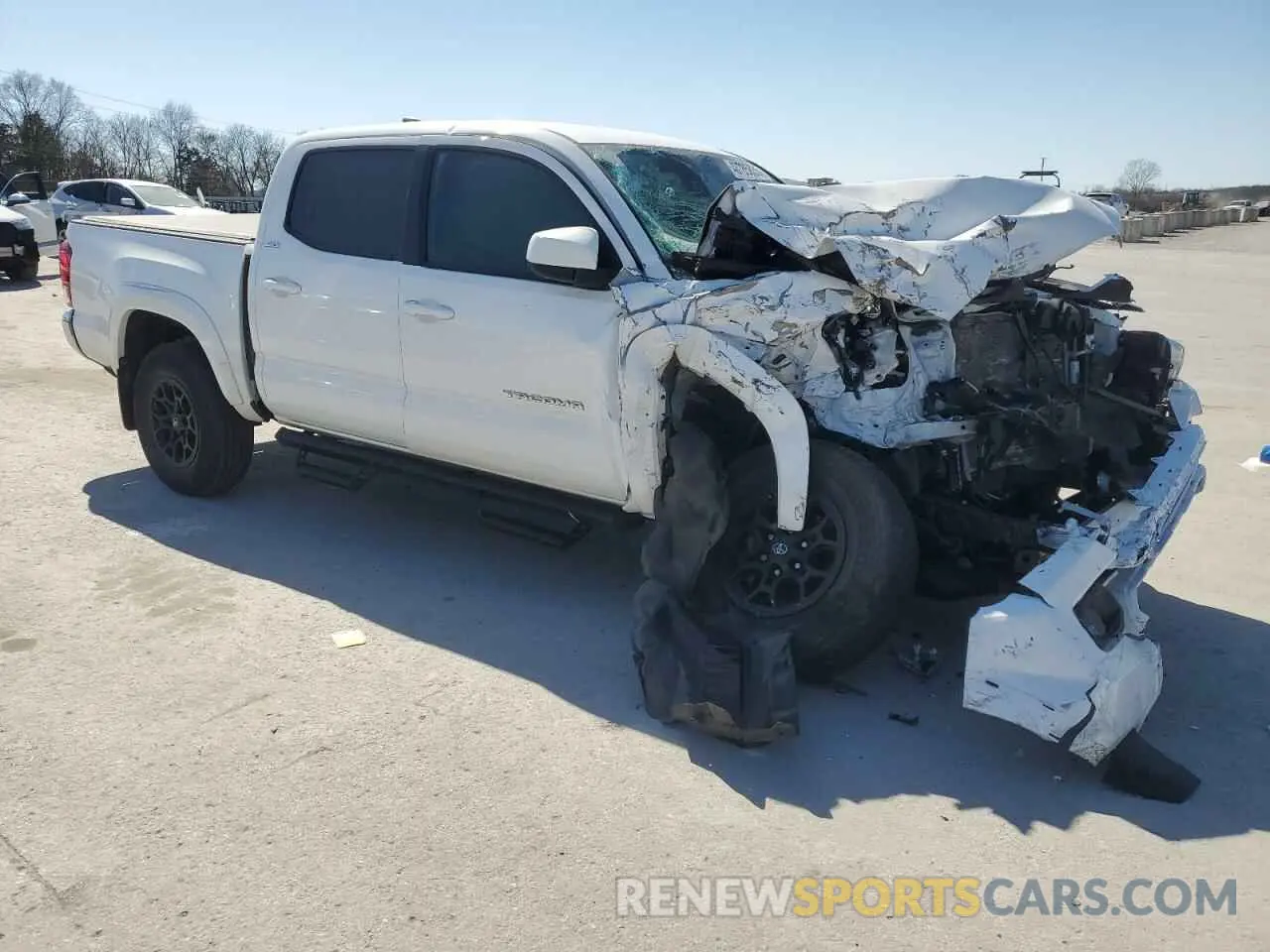 4 Photograph of a damaged car 3TMAZ5CN6NM175064 TOYOTA TACOMA 2022