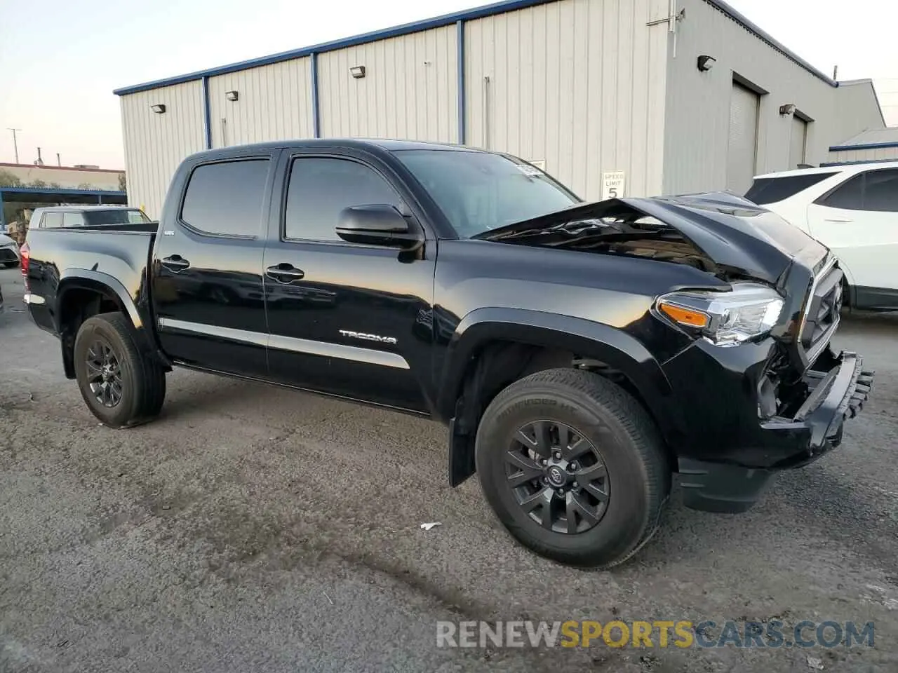 4 Photograph of a damaged car 3TMAZ5CN9NM181716 TOYOTA TACOMA 2022