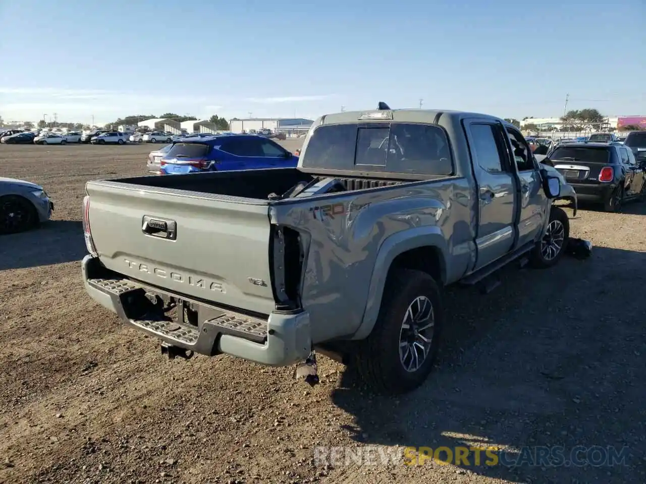 4 Photograph of a damaged car 3TMBZ5DN5NM033727 TOYOTA TACOMA 2022