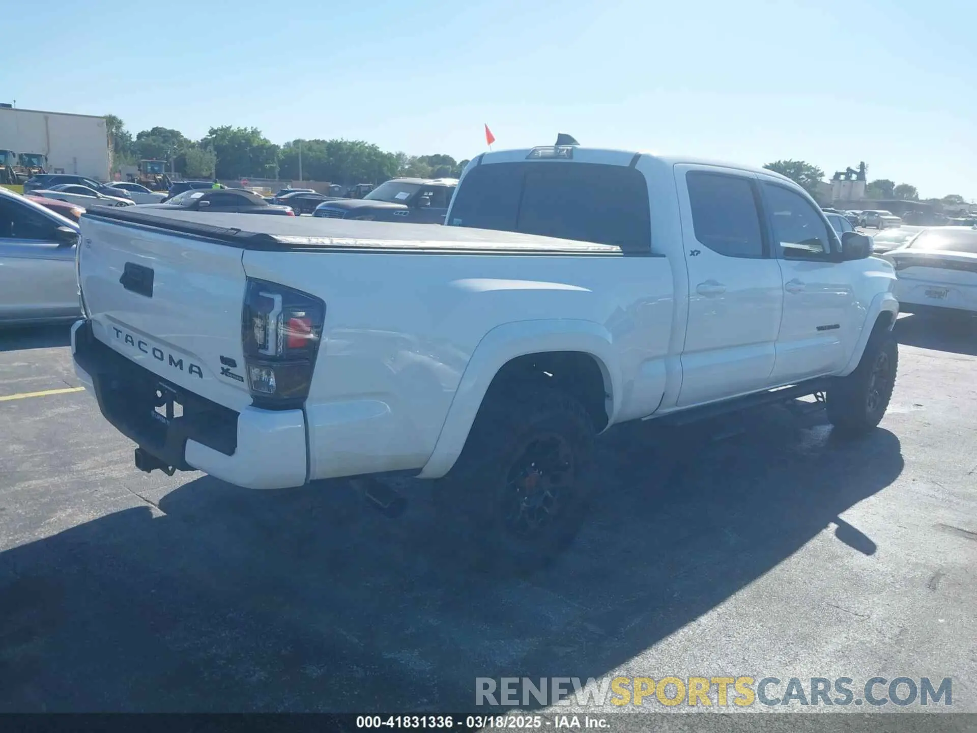 4 Photograph of a damaged car 3TMBZ5DN6NM037317 TOYOTA TACOMA 2022