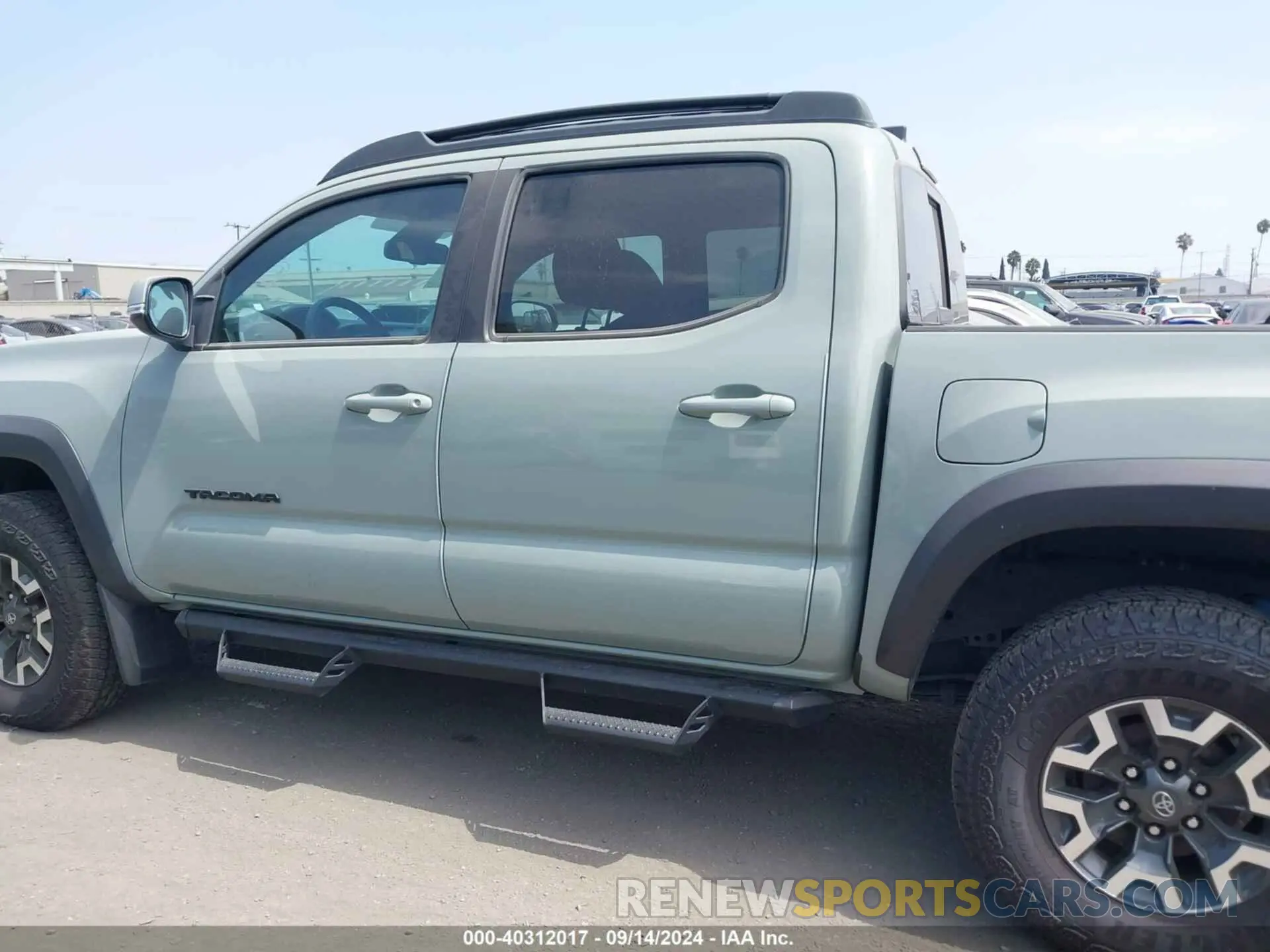 14 Photograph of a damaged car 3TMCZ5AN6NM506947 TOYOTA TACOMA 2022