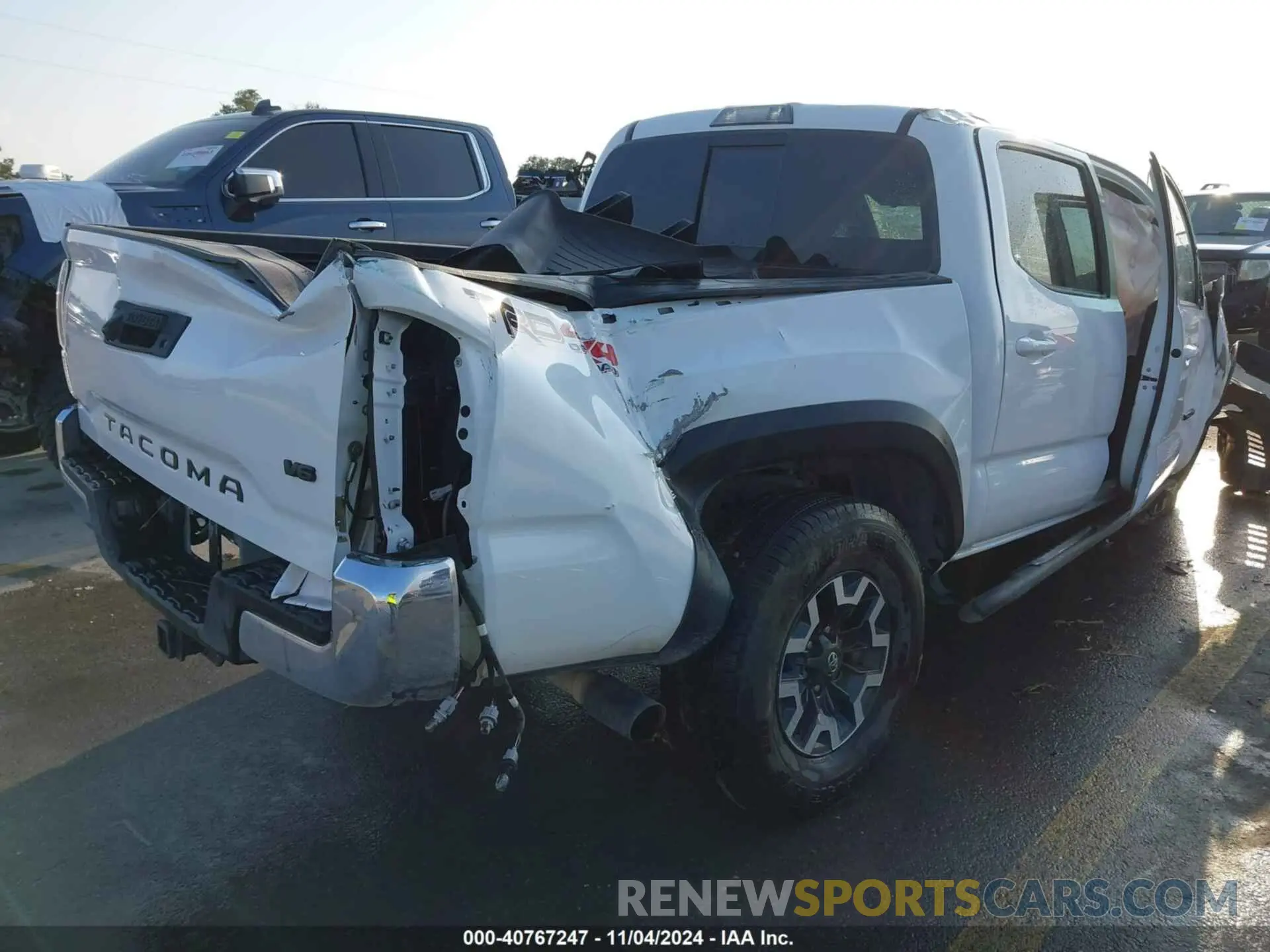 4 Photograph of a damaged car 3TMCZ5AN7NM497093 TOYOTA TACOMA 2022