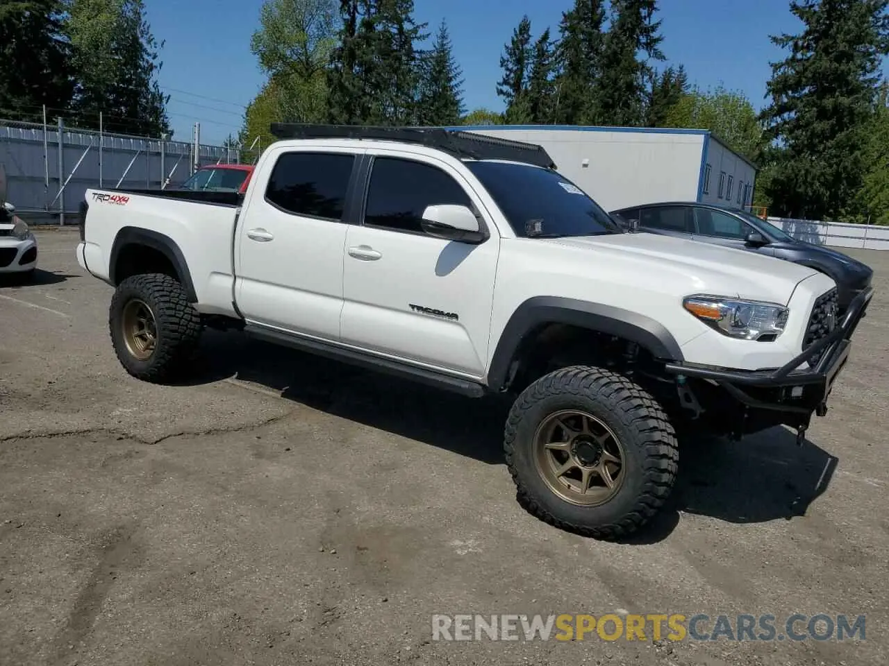 4 Photograph of a damaged car 3TMDZ5BN0NM124898 TOYOTA TACOMA 2022