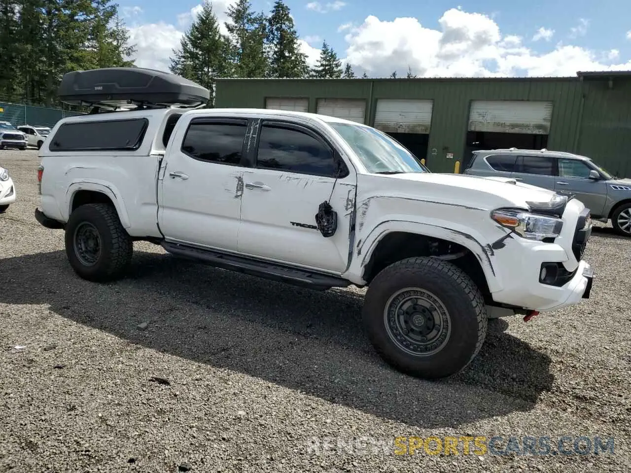 4 Photograph of a damaged car 3TMDZ5BN1NM136395 TOYOTA TACOMA 2022