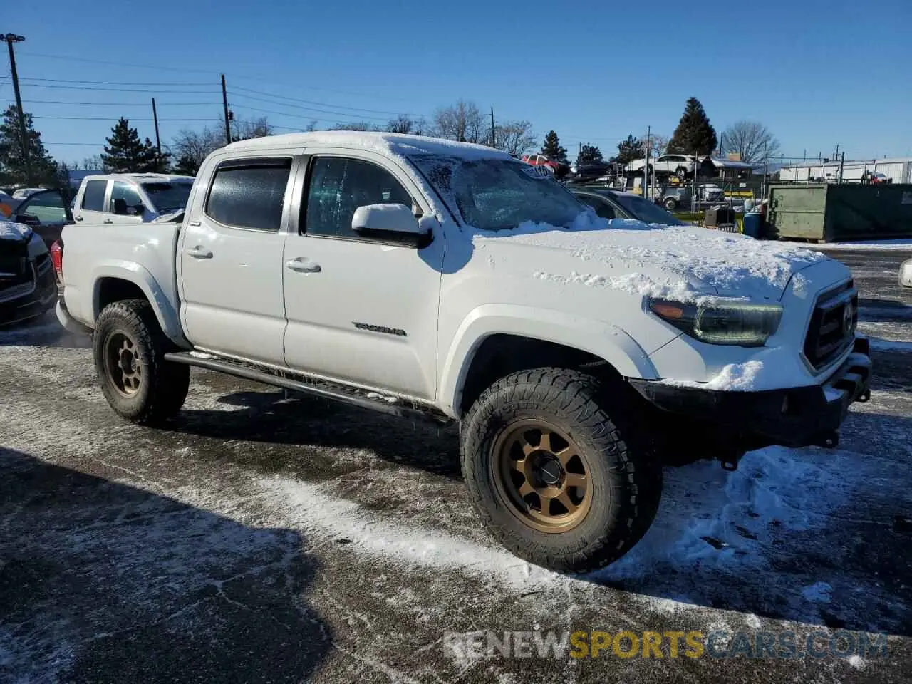 4 Photograph of a damaged car 3TYCZ5ANXNT082659 TOYOTA TACOMA 2022