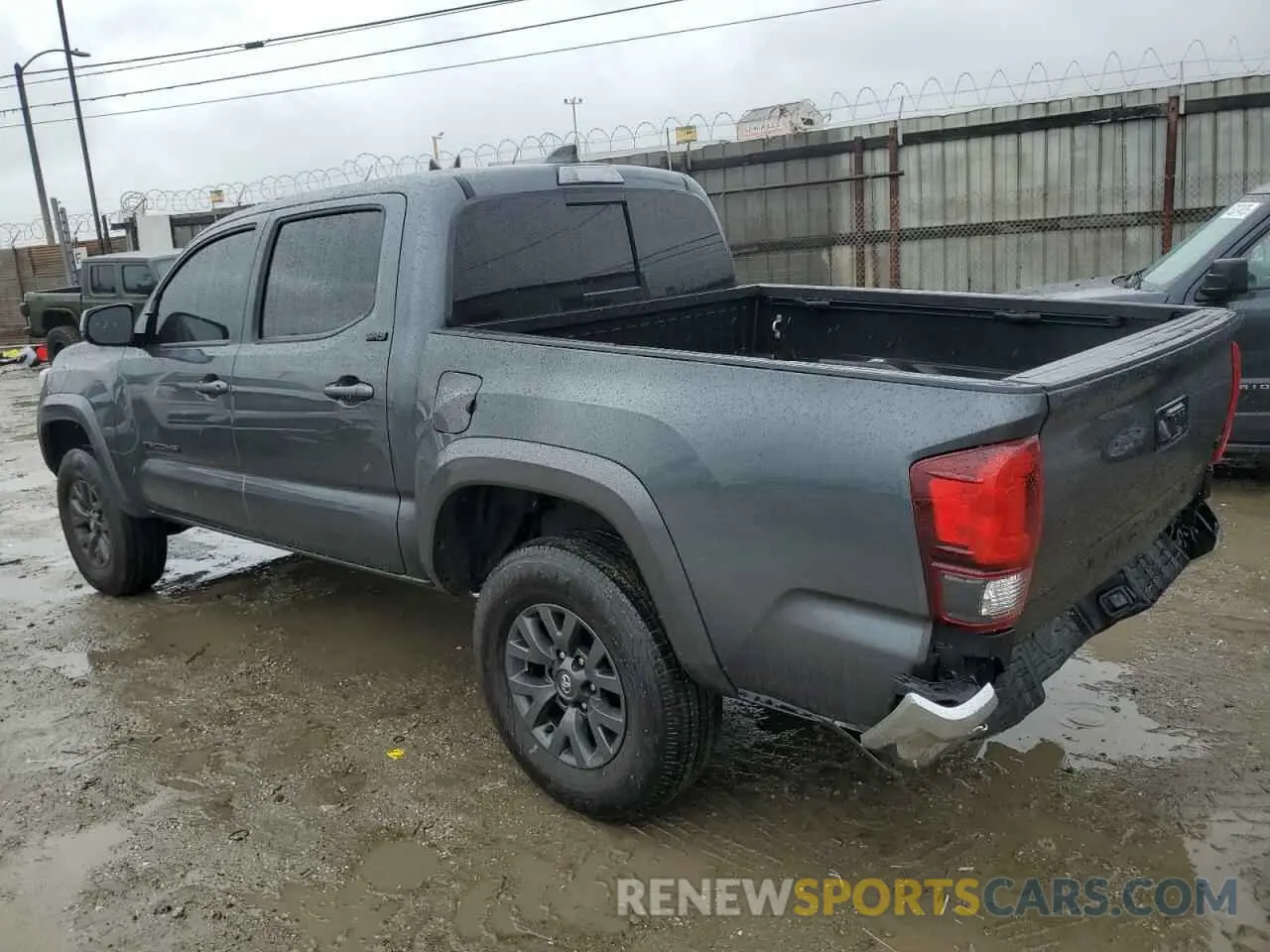 2 Photograph of a damaged car 3TMAZ5CN0PM210118 TOYOTA TACOMA 2023