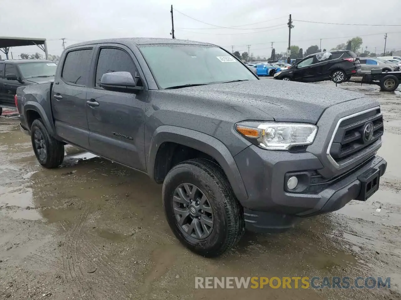 4 Photograph of a damaged car 3TMAZ5CN0PM210118 TOYOTA TACOMA 2023