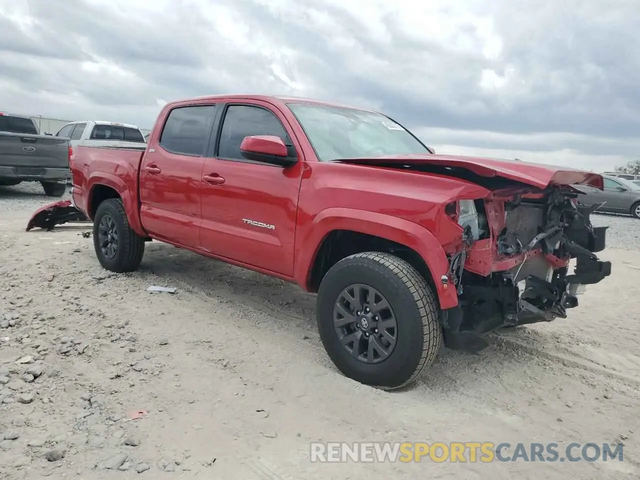 4 Photograph of a damaged car 3TMAZ5CN0PM210569 TOYOTA TACOMA 2023