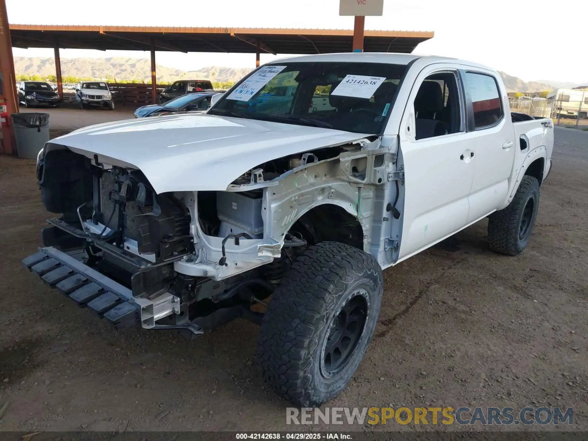 2 Photograph of a damaged car 3TMAZ5CN2PM201937 TOYOTA TACOMA 2023