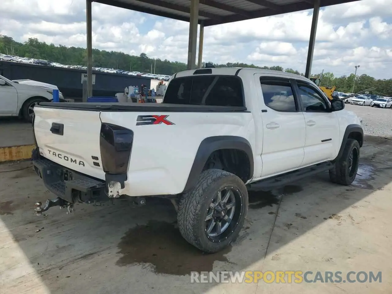 3 Photograph of a damaged car 3TMAZ5CN2PM202747 TOYOTA TACOMA 2023
