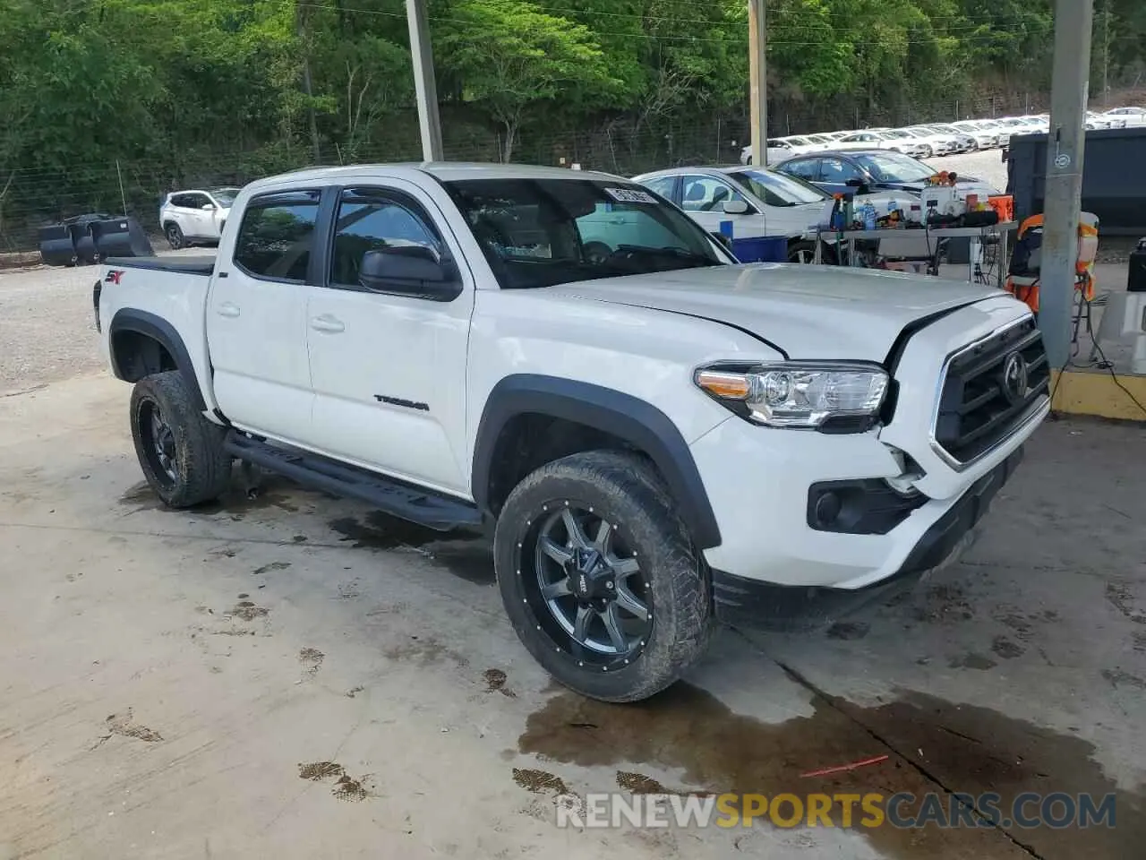 4 Photograph of a damaged car 3TMAZ5CN2PM202747 TOYOTA TACOMA 2023