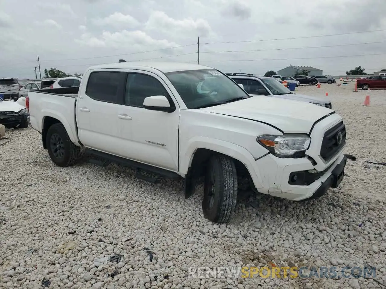 4 Photograph of a damaged car 3TMAZ5CN2PM209813 TOYOTA TACOMA 2023