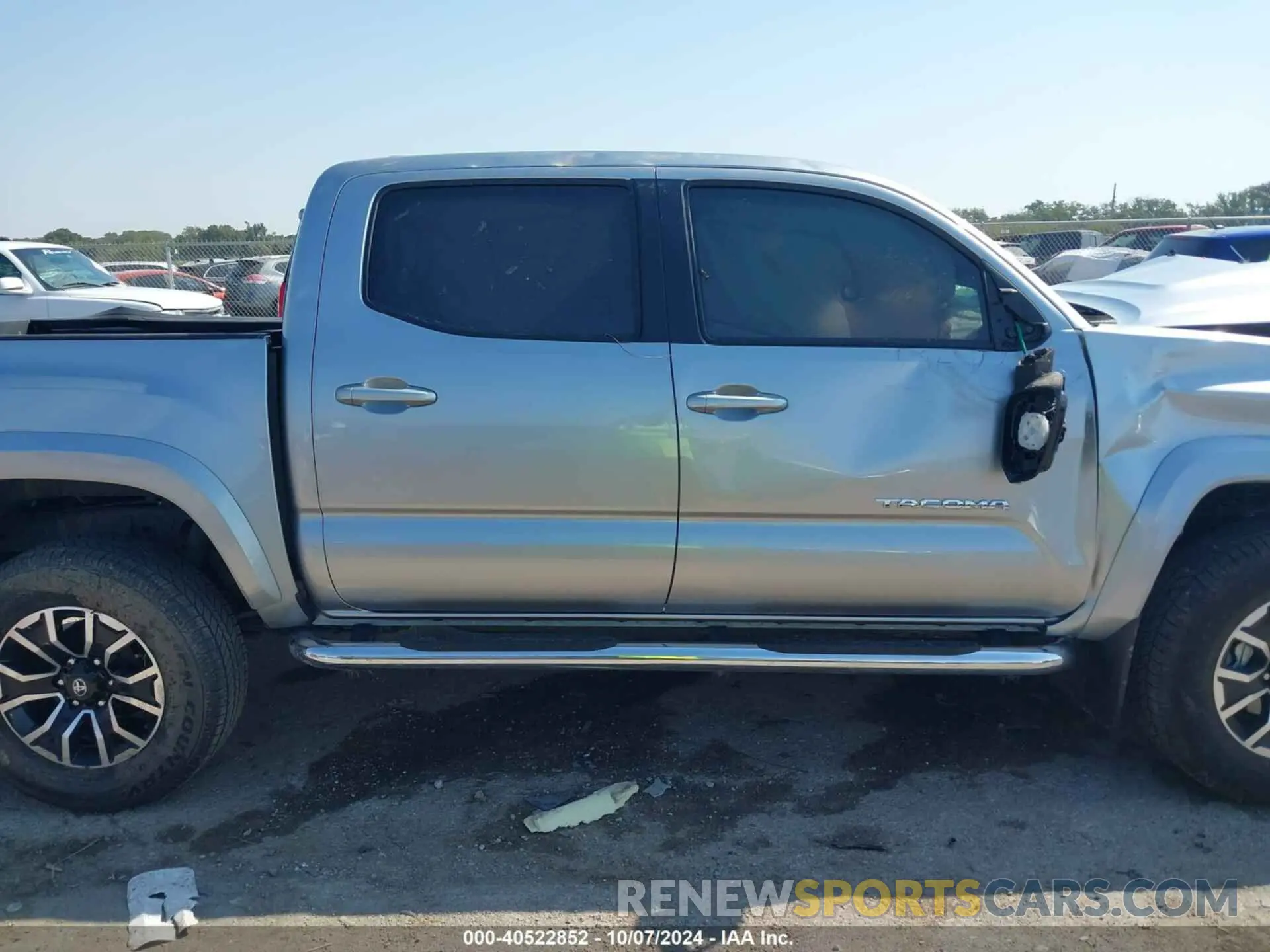 12 Photograph of a damaged car 3TMAZ5CN2PM218835 TOYOTA TACOMA 2023