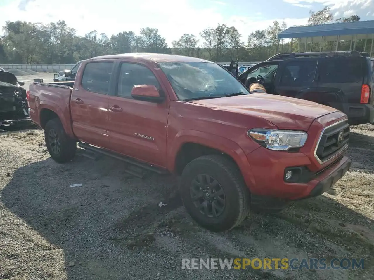 4 Photograph of a damaged car 3TMAZ5CN3PM212896 TOYOTA TACOMA 2023