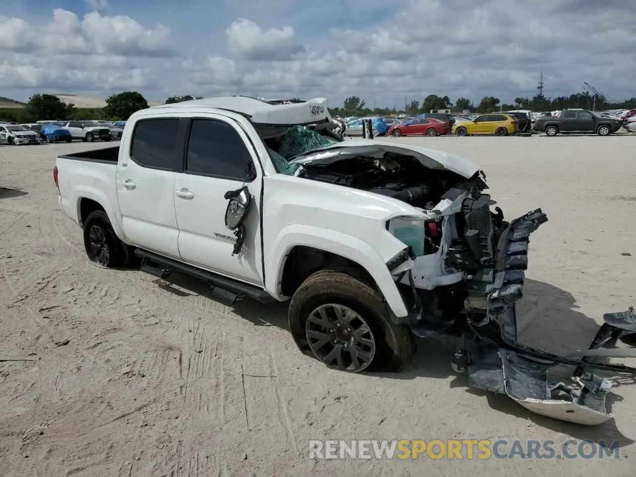 4 Photograph of a damaged car 3TMAZ5CN4PM214575 TOYOTA TACOMA 2023