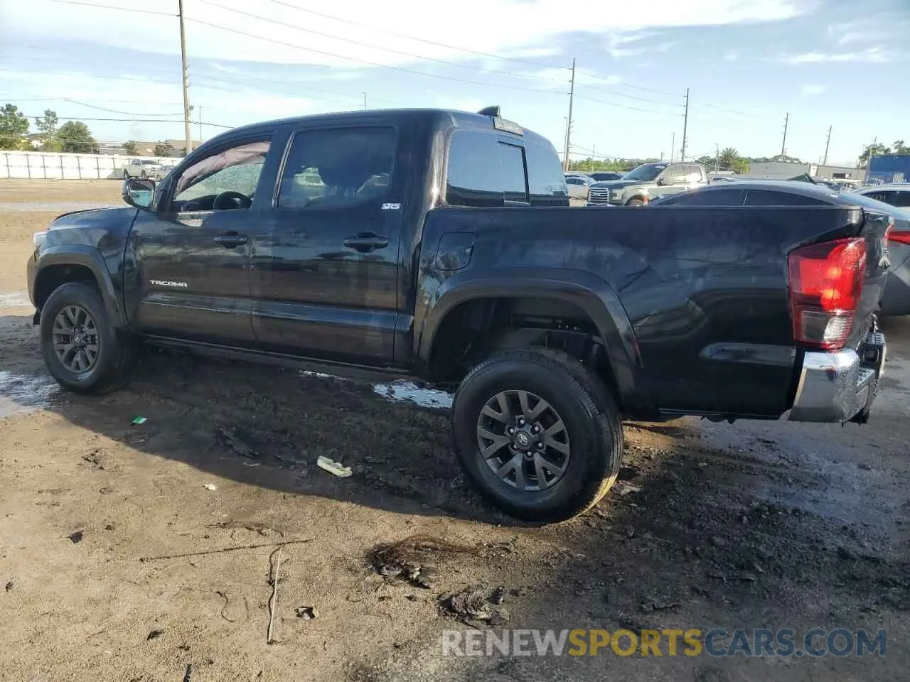 2 Photograph of a damaged car 3TMAZ5CN6PM205909 TOYOTA TACOMA 2023