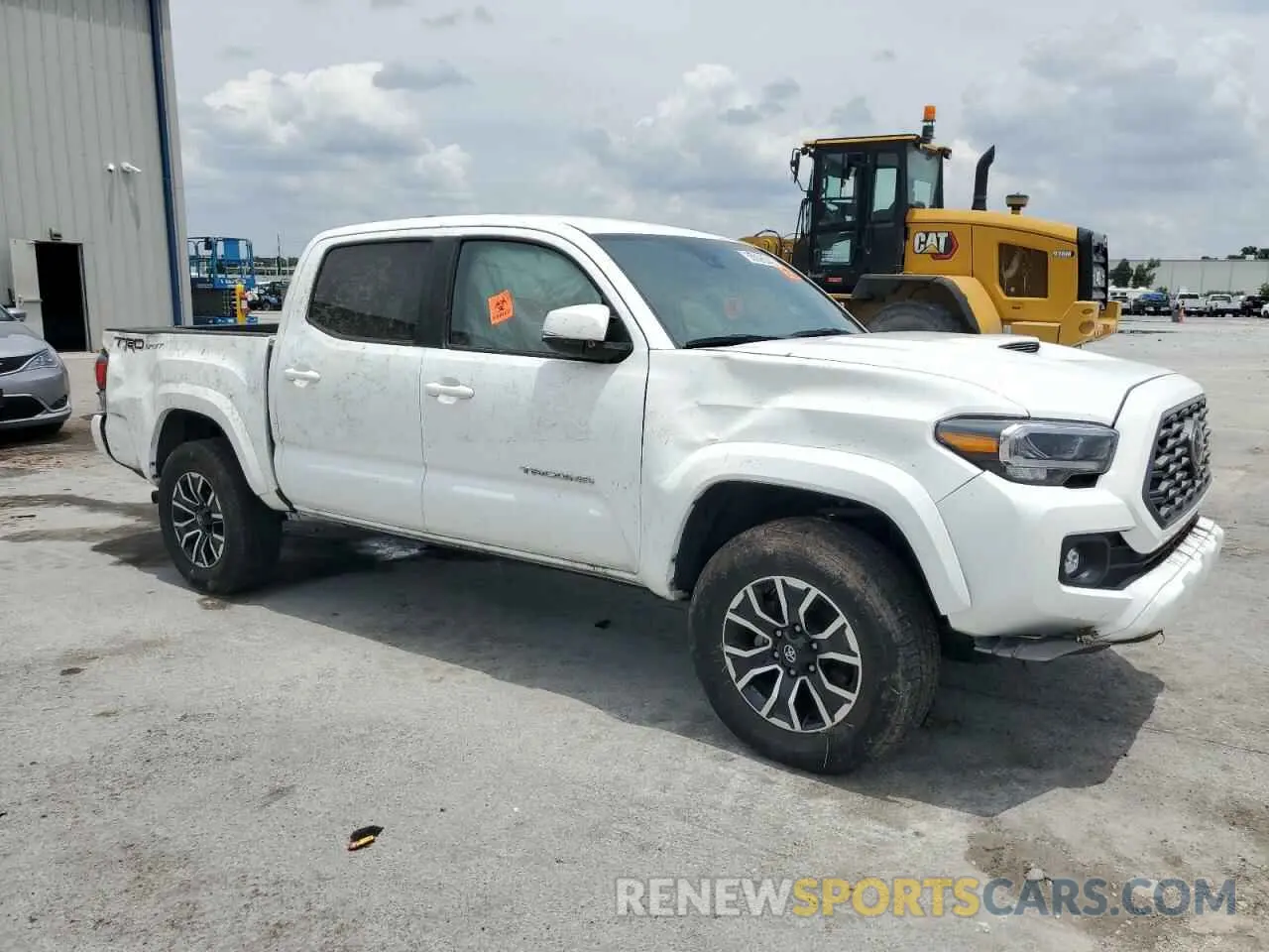 4 Photograph of a damaged car 3TMAZ5CN6PM212584 TOYOTA TACOMA 2023