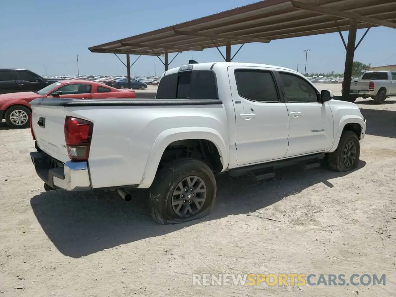 3 Photograph of a damaged car 3TMAZ5CN7PM201884 TOYOTA TACOMA 2023